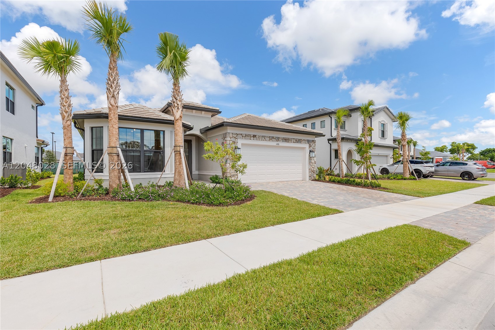 Welcome to Oak Tree, Pulte’s premier gated community, offering modern luxury and an exceptional South Florida lifestyle. This stunning Mystique one-story model features 4 bedrooms, 2 bathrooms, an expanded open-concept living area, and high-end designer finishes throughout. The gourmet chef’s kitchen showcases quartz countertops, premium cabinetry, stainless steel appliances, and a large center island, seamlessly flowing into the spacious living and dining areas—perfect for everyday living and entertaining.

Ideally located just steps from the resort-style clubhouse, residents enjoy outstanding amenities including a state-of-the-art fitness center, resort-style pool, BBQ pavilion, pickleball courts, scenic walking trails, and beautifully landscaped green spaces. Conveniently located with quick access to I-95 and the Florida Turnpike, and just minutes from Downtown Fort Lauderdale, Las Olas, the beach, Fort Lauderdale-Hollywood International Airport, shopping, dining, and entertainment. Don’t miss this opportunity to own one of the community’s most sought-after floor plans in one of Broward County’s fastest-growing neighborhoods.