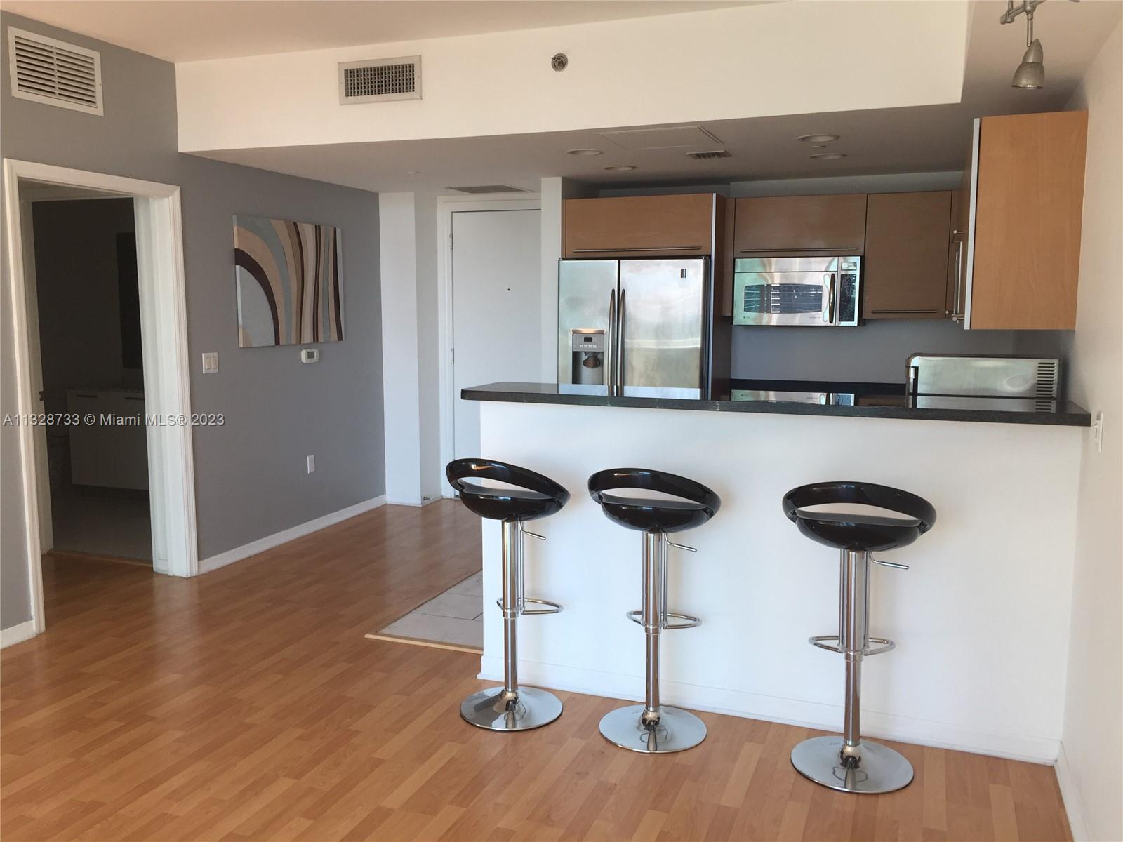 THE PLAZA 901 BRICKELL CO - Residential Lease