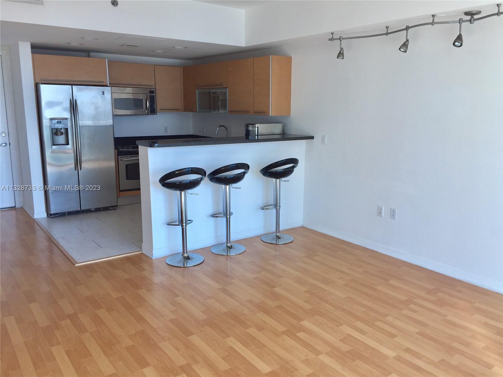 THE PLAZA 901 BRICKELL CO - Residential Lease