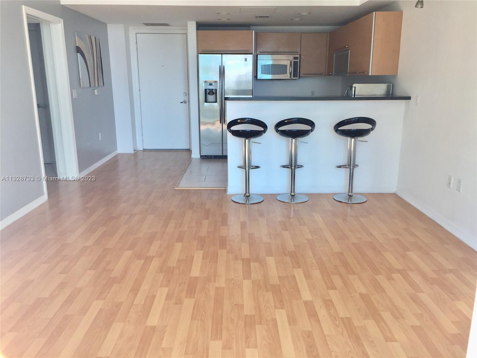 THE PLAZA 901 BRICKELL CO - Residential Lease