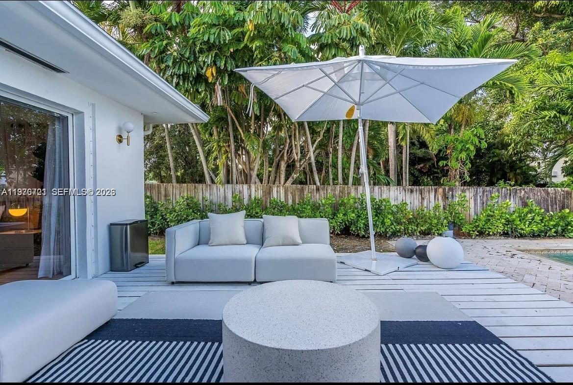 Completely remodeled and move-in ready in the desirable Miami Shores Area... this stunning home offers a spacious open-concept layout perfect for today’s lifestyle. Flooded with natural light, the bright and airy interior highlights contemporary upgrades, seamless flow between living spaces, and a welcoming ambiance throughout.Gorgeous porcelain floors extend throughout the residence, complementing the spacious open layout and sun-drenched living areas. Over $200,000.00 invested in upgrades..Do not miss this opportunity...Call listing agent for showing instructions.