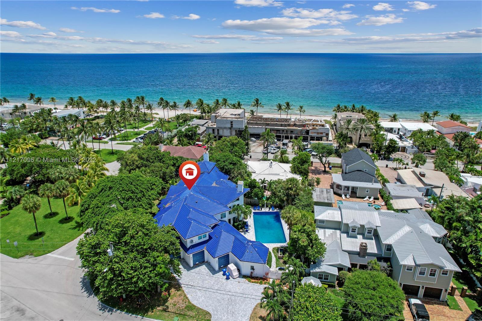 Just a short walk to the sparkling blue Atlantic Ocean, this 5-bedroom, 6 1/2-bathroom home is the ideal main residence or your 2nd home on the beach.  The open first floor design features a dazzling entry, striking 20-foot ceilings, formal dining room, eat-in gourmet kitchen, leading out the great room, drawing your attention to the resort sized pool.  An outdoor kitchen/bar and covered patio is perfect for parties and entertaining.  The enormous master suite comes with 360° panoramic views, whirlpool, steam room, walk-in custom closet, and a private eagle’s nest retreat.  Additional 1st floor rooms include a gym, utility room, and spacious 3-car garage, and more. Located on one of the largest lots in this exclusive beach Ft. Lauderdale area, do not miss this opportunity in paradise.