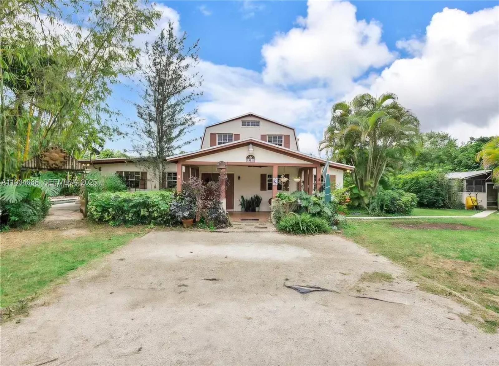 Welcome to your peaceful oasis! This 4 Bedroom, 3 bath home has attached in-law quarters for additional living space. The property sits on 1.26 acres with a pool, chicken coop, vegetable garden, and detached workshop, all surrounded by lush landscaping and fruit trees. Numerous updates include a whole home water filtration system, 2 ACs, new washer, dryer, refrigerator, dishwasher and water pump. The floorplan is flexible with an office space that could be an extra bedroom and in-law quarters with full bathroom, kitchenette and living space. The entire second floor is the primary suite with a sitting area and ample closet space.