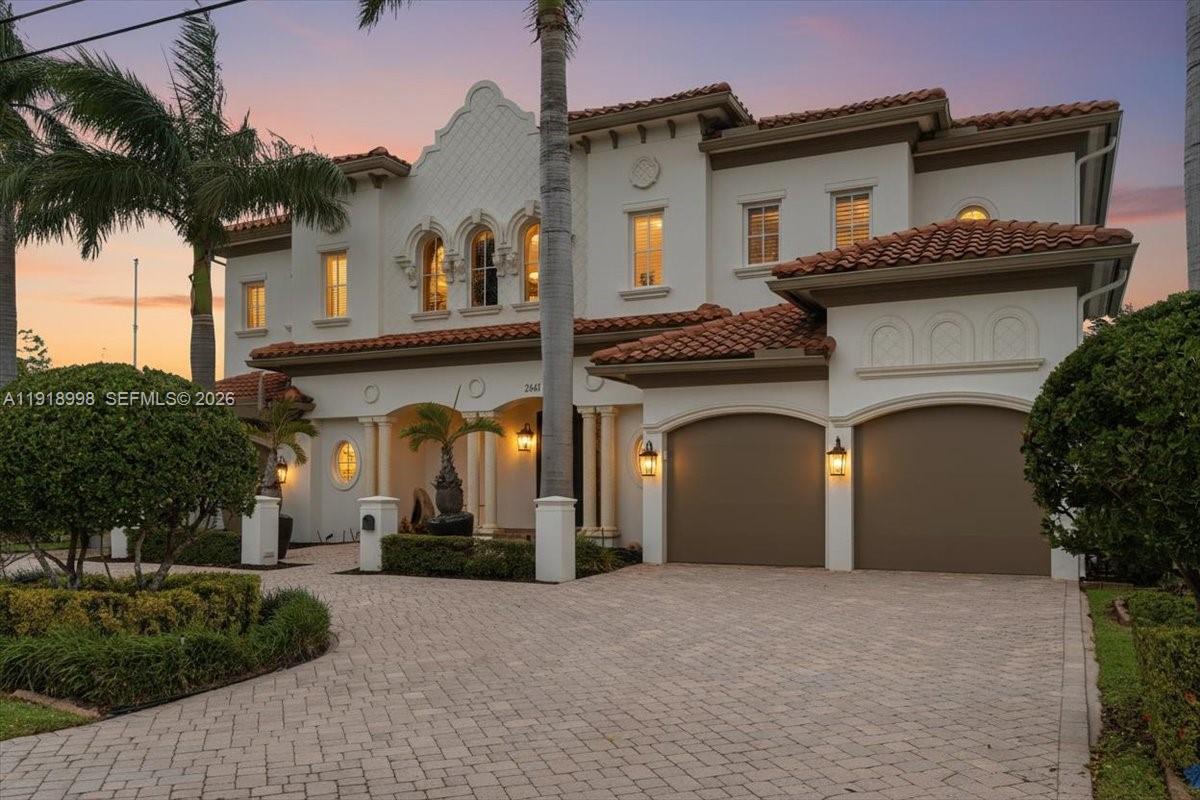 ONE Owner Ever. Custom Built And Intentionally Designed, This Waterfront Home Is A True Fortress. Elevated CBS Construction. Solid, Secure, And Meticulously Maintained. Built Different On Purpose. Set On 80 Feet Of Prime Waterfront With No Fixed Bridges And Direct Intracoastal Access, Ocean-Bound In Minutes. Catamaran Friendly With A Brand-New Boat Lift, Exceptional Dockage For Serious Boaters, And Four-Car Garage Parking. Inside, 23-Foot Volume Ceilings Make An Immediate Statement Alongside A Sculptural Spiral Staircase, Private Elevator, Theater Room, Wine Cellar, Marble And Tile Flooring, Plantation Shutters, And Three Balconies Plus A Rooftop Deck That Frames The Water Like Living Art. The Kitchen Is Designed For Real Entertaining With Natural Gas Cooking And Seamless Flow Into Formal And Casual Dining Spaces. Four-Zone HVAC And Full Impact Protection Provide Peace Of Mind. Outside Feels Like A Private Resort With A Sparkling Pool, Wide Water Views, And Lush Landscaping Where Every Day Feels Elevated. Minutes To Pompano Beach Dining, Nightlife, Festivals, Amphitheater, Parks, And White Sand Beaches. This Is Not Just A House. It’s A Statement, A Stronghold, A One-Owner Legacy Home. Ask About The Feature List And Architectural Plans, And Let’s Flamingle.