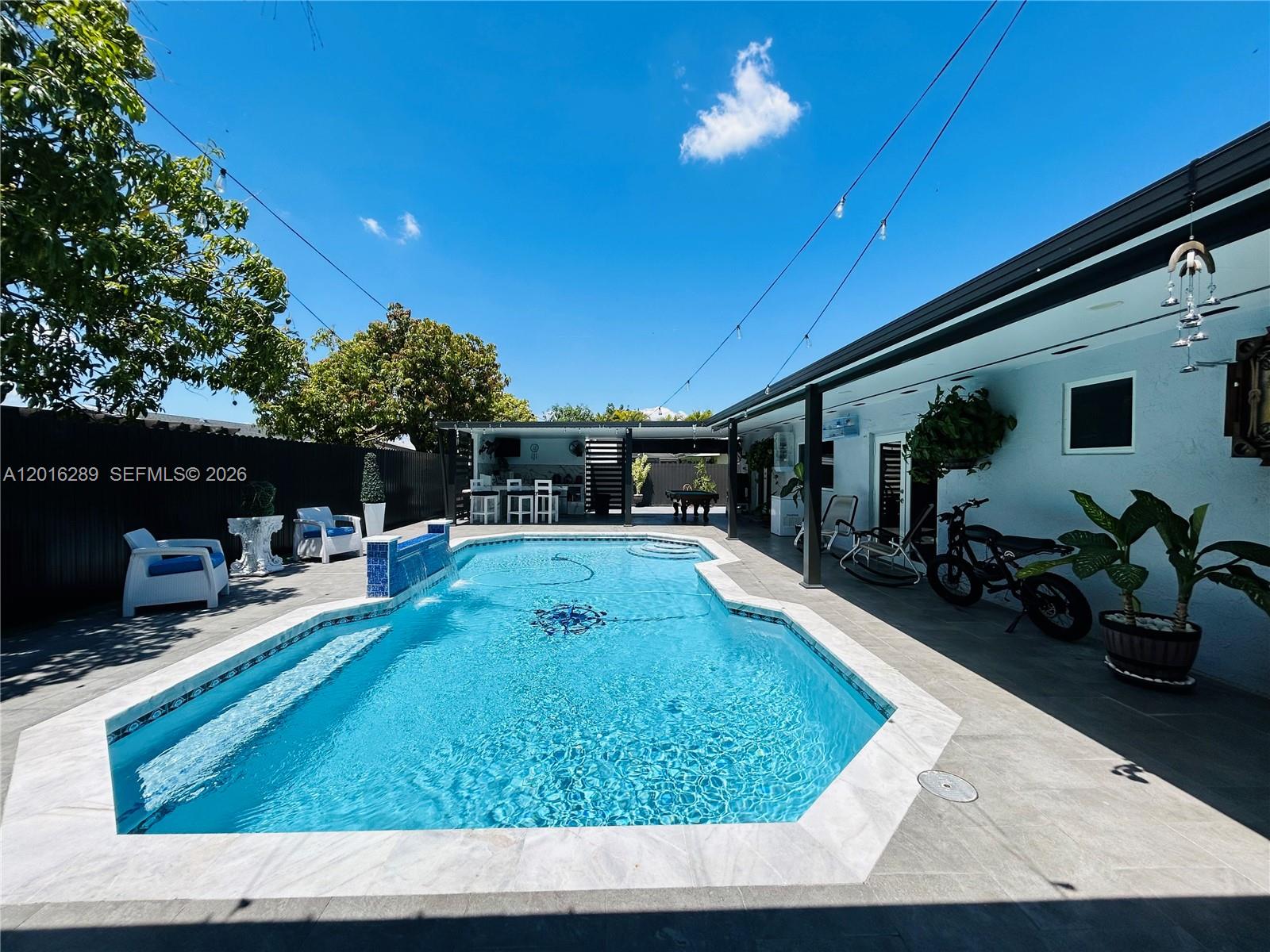OPEN HOUSE SUNDAY, 17th from 12 PM to 2 PM. Beautiful move-in ready home featuring a private pool, solar panels, and full impact windows and doors. Impeccably maintained with a bright, spacious, and cozy layout designed for comfortable living and entertaining. Just bring your belongings and enjoy.