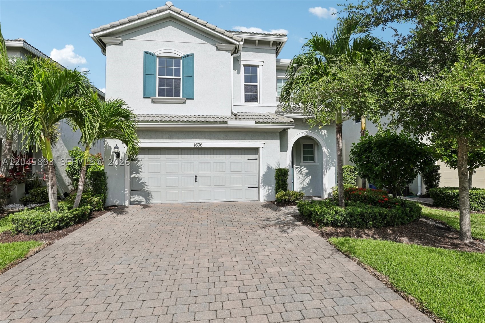 Welcome to 1636 Trailhead Terrace, a newer construction residence in the prestigious gated community of Parkview at Hillcrest. Built in 2021, this elegant 3-bedroom, 2.5-bath home offers a sophisticated blend of modern living, timeless design, and the relaxed luxury of South Florida living. From the moment you enter, you’ll appreciate the thoughtfully designed open-concept floor plan filled with natural light and a seamless flow between living, dining, and entertaining spaces. The first floor showcases refined tile flooring, while the second level features plush carpeting throughout the private living areas, creating a warm atmosphere. The spacious bedrooms provide privacy, with the primary suite offering a serene retreat. Beyond your front door, Parkview at Hillcrest delivers a resort-inspired lifestyle with a clubhouse, pool, fitness center, tennis and pickleball courts, playgrounds, BBQ areas, and scenic walking trails. Ideally located in Hollywood, this residence places you minutes from Hollywood Beach Broadwalk, waterfront dining, Aventura Mall, Hard Rock Hotel & Casino, Memorial Regional Hospital, and major highways connecting you to Fort Lauderdale and Miami. Residents love Hollywood for its coastal charm, vibrant entertainment, diverse dining, and outdoor lifestyle. This home offers the rare combination of newer construction, luxury amenities, and an exceptional location—a residence designed not only for where you live, but how you live. A lifestyle beyond compare.