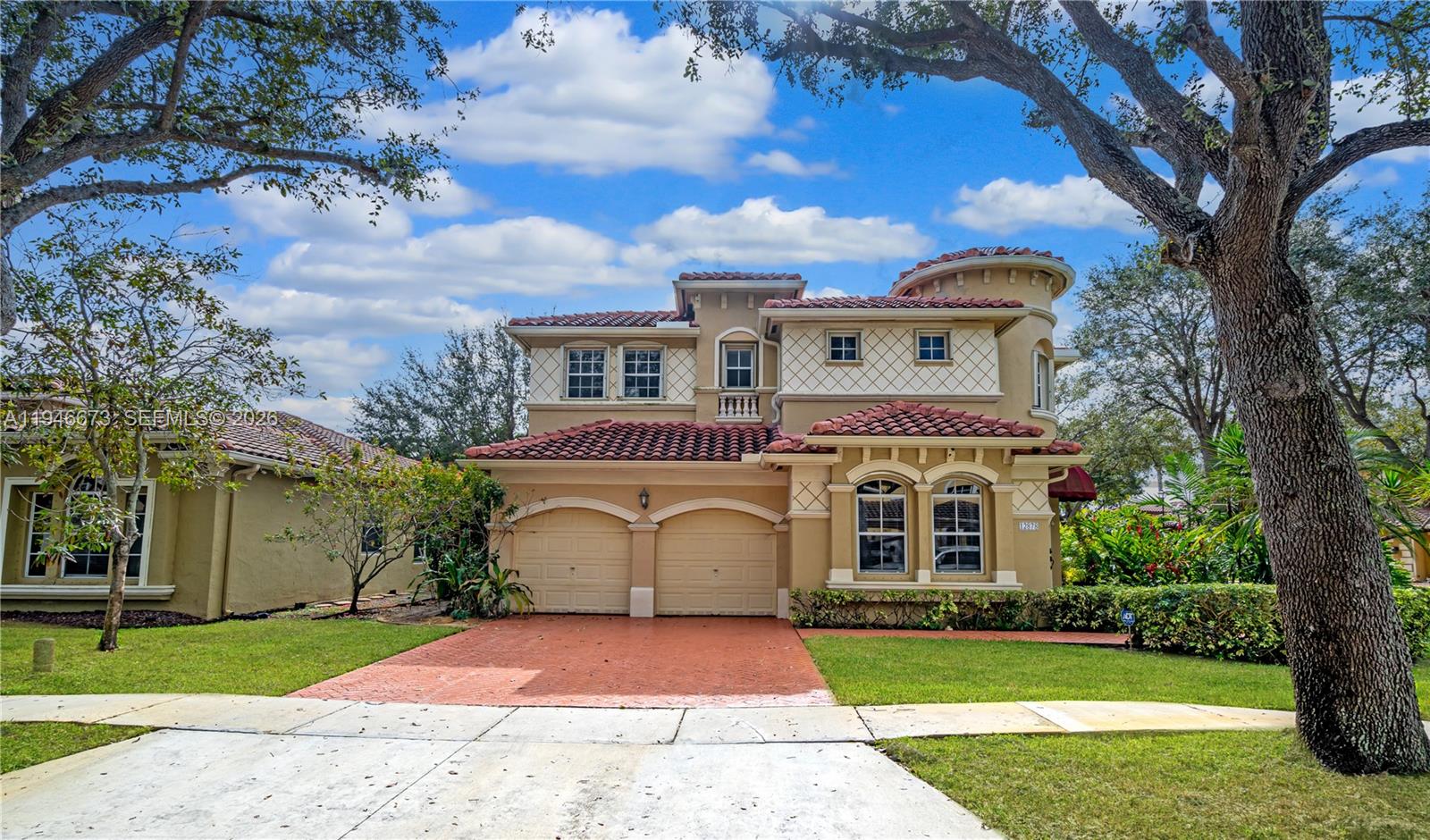 Welcome to this spacious 5 bedroom, 3 bath home in Vizcaya’s desirable Bellagio section! From the upstairs primary suite, enjoy serene lake views. Situated on a corner lot, this home features a brand new roof and a flexible layout with a full bedroom and bath downstairs, ideal for guests or multigenerational living. The open concept design includes vaulted ceilings, an updated kitchen that flows into the living spaces, and abundant natural light. Walk in closets throughout. Accordion shutters provide storm protection upstairs. The gated community offers roving security, a clubhouse, pool, and easy access to top schools, shopping, and highways. Please note, no sight unseen offers will be accepted. We invite you to tour this home in person. Move in ready and easy to show!