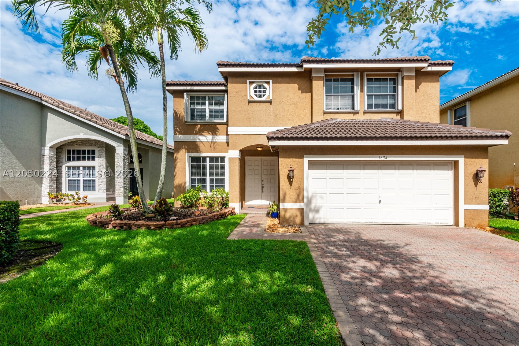 Well-maintained two-story home in the Silver Shores community of Miramar, offering 2,989 sq ft of living space on 5,335 sq ft lot. The renovated kitchen features granite countertops in an open layout, ideal for everyday living and entertaining. Tile flooring runs throughout the first floor, with wood flooring upstairs with renovated main bathroom. The primary suite offers his and hers closets. All four bedrooms are located in the second floor. The private backyard offers outdoor space away from view. A solid option for buyers looking for a functional layout  with clear separation between living and sleeping areas.