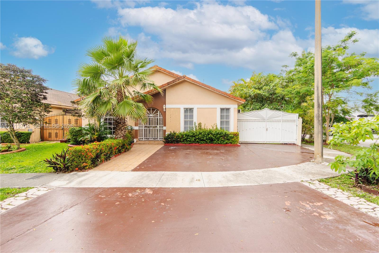 THIS HIALEAH GARDENS GEM SITS ON A CORNER LOT WITH AMPLE PRIVATE PARKING FOR SEVERAL CARS. 
Beautiful 3-bedroom, 3-bathroom home offering 1,605 sq ft of living space, ideally situated on a desirable corner lot in Hialeah Gardens. Located directly across from a park, this property offers serene views and added privacy with no front neighbors Perfect for families to enjoy outdoor space just steps from home. Designed with versatility in mind, the home features a well-planned layout ideal for multi-generational living, including a separate bedroom and full bathroom that provides privacy and comfort for in-laws, guests, or extended family.
Spacious living areas and generously sized bedrooms create a warm and functional environment for everyday living and entertaining. Centrally located with easy access to I-75, the Florida Turnpike, and the Palmetto Expressway, this home offers unmatched convenience for commuting, shopping, dining, and schools.
A rare opportunity for families seeking space, flexibility, and a prime location in a welcoming neighborhood.
SORRY, NO SUNDAY SHOWINGS. SHOWING TIMES ARE ONLY 12-4PM Monday- Saturday.