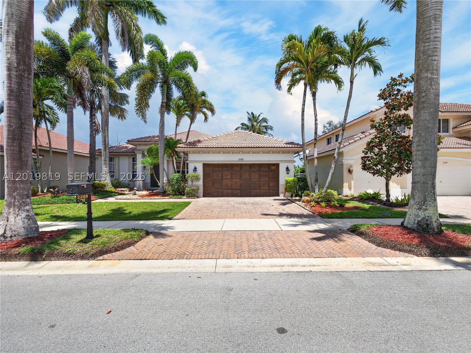 Motivated Seller! Single-story home with direct lake views in Hunters Pointe II at Weston Hills Country Club — voted the most desirable in Broward and Miami-Dade in an NBC-6 survey, 4 bed / 2.5 bath, 2,674 SF of living space on a nearly 9,500 SF lot. High ceilings, brand-new refrigerator, dishwasher, cooktop, and wine cooler, fresh interior paint, tile and laminate floors, laundry room, hurricane shutters, 2-car garage, and all bedrooms grouped on one wing for privacy. The covered rear patio overlooking the lake is where the day starts right — morning sunrises over the water, weekend BBQs with family and friends, and quiet South Florida evenings that make you forget everything else.-

24/7 guard-gated community with resort-caliber amenities. Minutes from I-75 and Weston Town Center. Zoned for Gator Run Elementary (A-), Falcon Cove Middle (A-), and Cypress Bay High (A+) — consistently top-ranked in Florida. Call or text to schedule a private showing