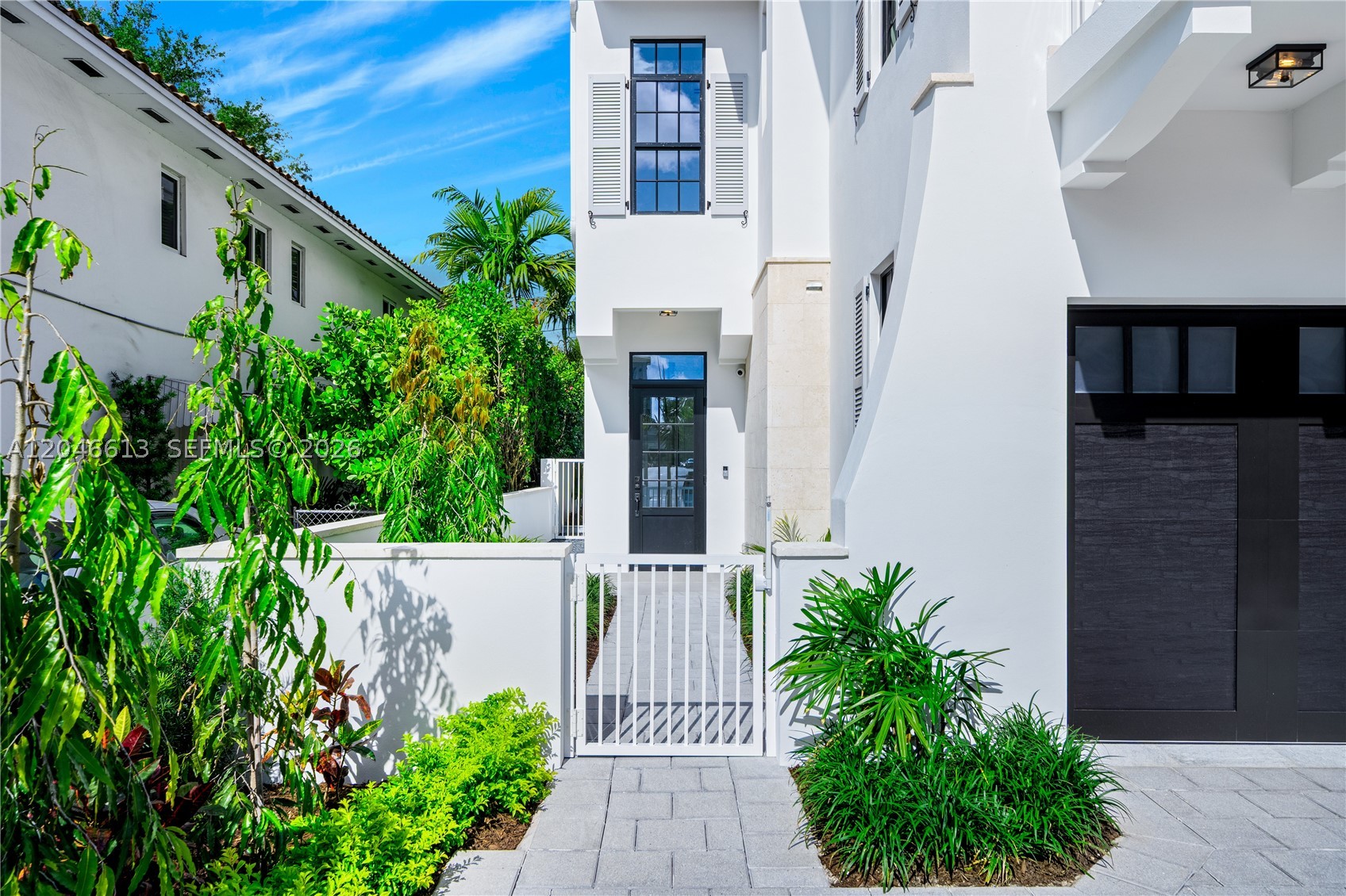 FULLY FURNISHED NEW CONSTRUCTION WALKING DISTANCE FROM CORAL GABLES FINANCIAL DISTRICT HAS JUST BEEN COMPLETED! Luxurious 3 bdrm / 2.5 baths, 1 car garage and private yard with plunge pool & BBQ. Kitchens feature Namibia White Calacatta marble countertops, & top-of-the-line Thermador appliances. Eurodesign Italian cabinetry with German Blum self-closing hardware. Spanish porcelain 32” x 64” floors in living areas. 11’ ceilings on the 1st floor & soaring 13-16’ ceilings on the 2nd floor. Bathrooms feature oversized 48” x 110” porcelain, Venatino Fantastic Quartz countertops & Grohe fixtures. Steel columns with reinforced concrete construction with ES impact resistant windows, solid 8’ concrete dividing wall between units and double-insulation roofs. Fully built out closets + tankless water heaters. Wired for Sonos with installed speakers throughout, Ring entry cameras + 4 additional perimeter cameras. Each yard features a tri-level mosaic tiled plunge pool with heater & 5 jets + Dominican Keystone lined walls. Automated irrigation sub-meter system sub-meter, exterior lighting controllable by app & concrete perimeter fence. Walking distance to Coral Gables Financial District with dozens of restaurants, shops & cafes providing the ultimate in urban living.