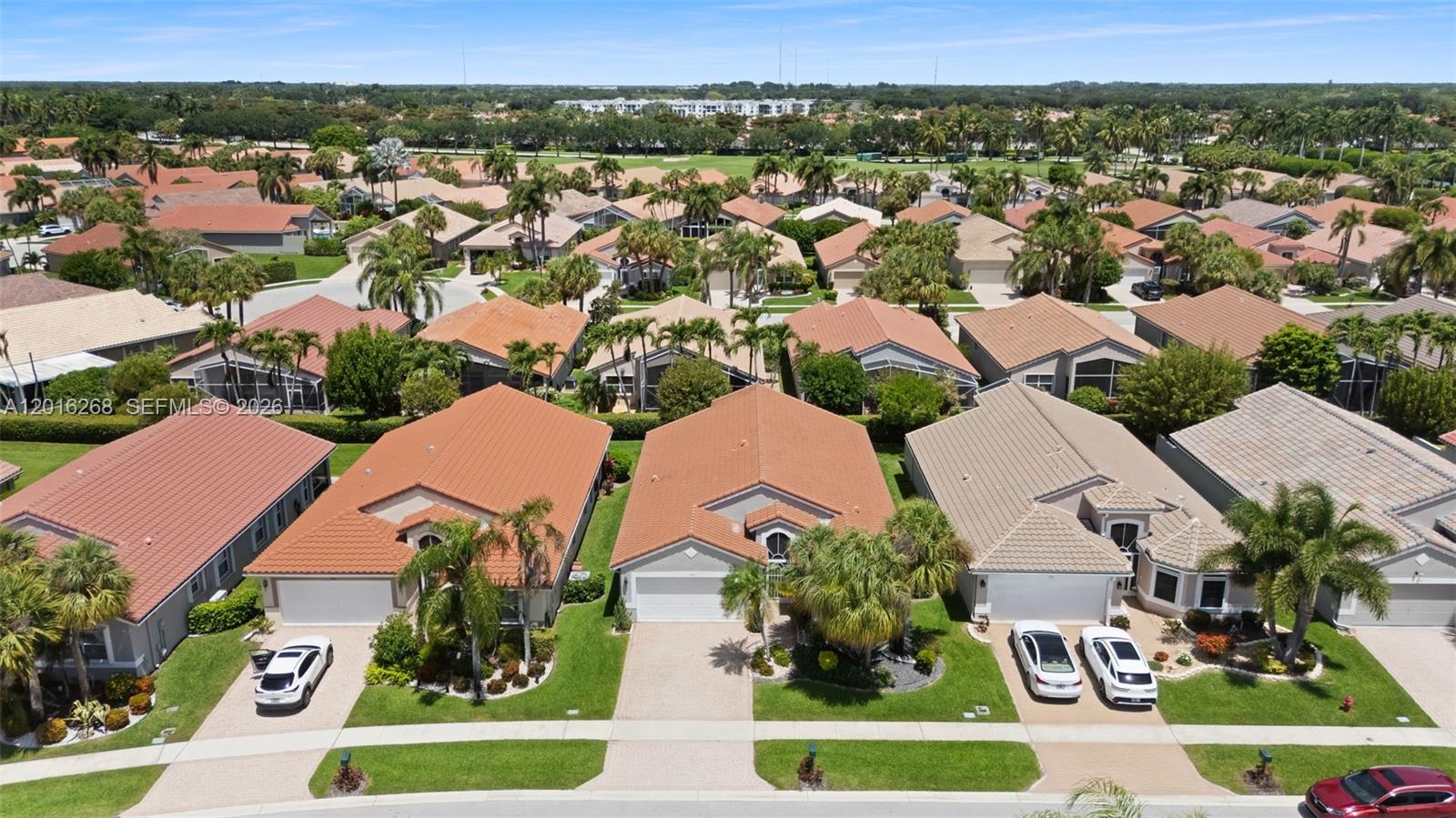 Welcome to 7178 Haviland Circle, a well-maintained Balmoral model located in Limoge at The Cascades, a desirable gated 55+ community in Boynton Beach. This 3-bedroom, 2-bath residence offers a spacious and functional floor plan with vaulted ceilings throughout, creating an open and airy feel. The home has been freshly painted throughout and features recent grout restoration and sealing, along with new white oak-style laminate flooring in the guest bedroom. The third bedroom is currently set up as an office with a built-in Murphy bed, making it ideal for a home office, guest suite, or flexible living space. Enjoy Florida living from the covered lanai, perfect for relaxing or entertaining. The Cascades offers a vibrant active-adult lifestyle with a clubhouse, café, fitness center, resort-style pool and spa, sports courts, clubs, entertainment, and social activities. Ready for its next homeowner to make their personal touches and enjoy all that The Cascades has to offer.