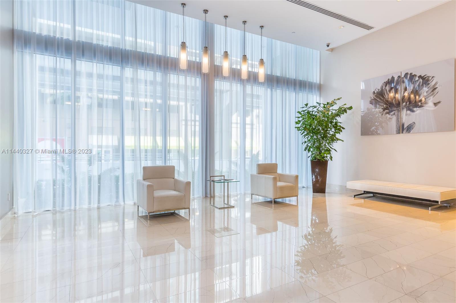 Great Deal for this 2/2 split floor plan unit at Axis with porcelain floors ,large balcony accessible from every room,10 feet panoramic glass windows extend from floor to ceiling. The European-style kitchen has stainless steel appliances. Unit comes with a tandem parking for 2 cars .
