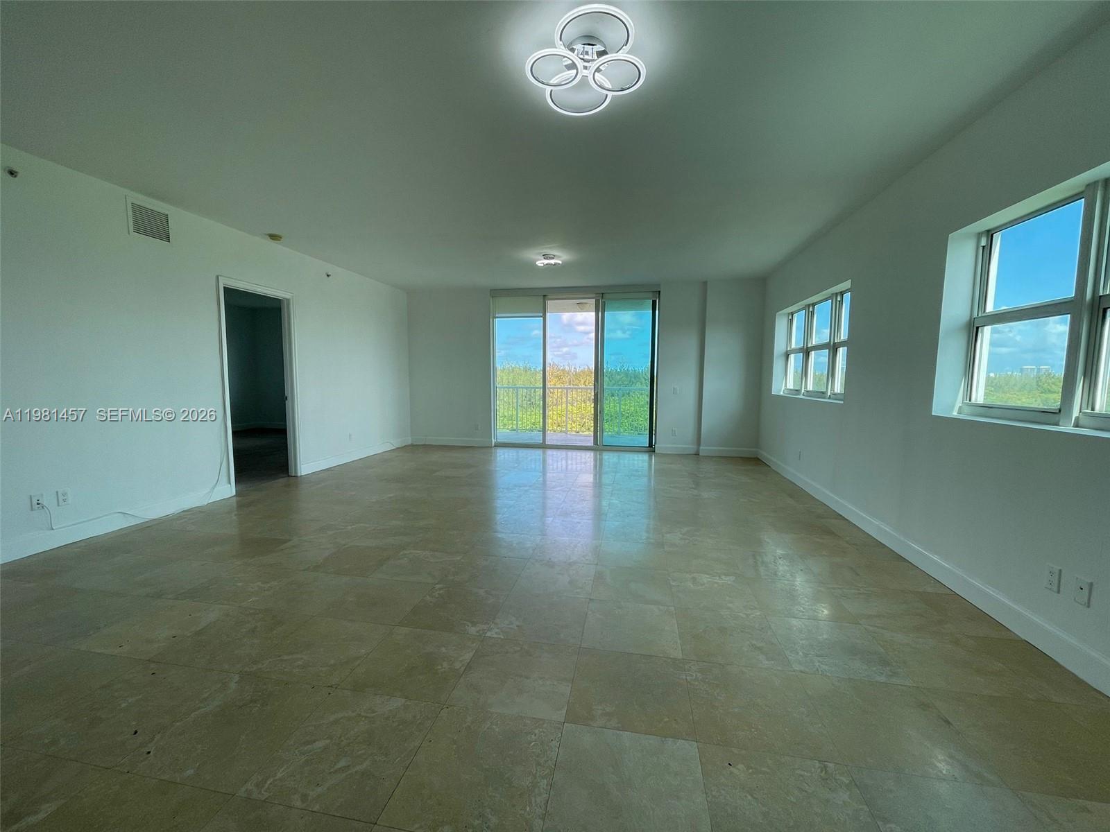 Rare corner unit offering 2,385 SQFT with 3 bedrooms + den and 3.5 bathrooms. Bright and spacious layout with large windows and beautiful views. Features include Italian-style kitchen cabinetry, stainless steel appliances, marble flooring in common areas, impact windows, and washer/dryer in unit. Building amenities include a fully equipped gym and covered parking. Tenant occupied until July 17
