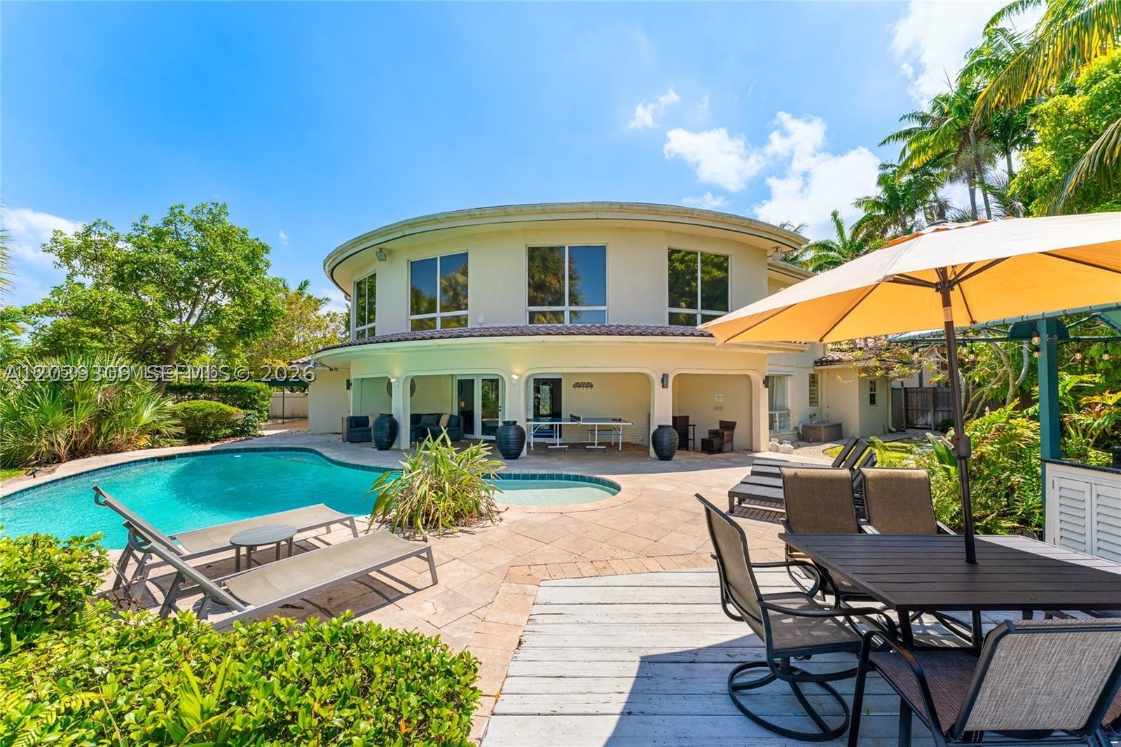 BEST PRICED 7 BED WATERFRONT PROPERTY WITHIN AT LEAST 10 MILES! YOUR WATERFRONT PARADISE AWAITS! Step Into A Rare South Florida Property Featuring 110 Feet Of Prime Waterfront, A Fully Renovated Interior, And NO HOA. This Beautiful Residence Offers Bright Open Living Spaces And Water Views That Bring The Coastal Lifestyle To Every Corner Of The Home. Step Outside To Your Own Private Tropical Getaway With Avocado Trees + Featuring A Resort Style Pool, Jacuzzi, Fire Pit, Built In Grill And Wet Bar, All Designed For Unforgettable Gatherings And Effortless Waterfront Living. The Wraparound Patio And Seamless Indoor Outdoor Flow Create A Natural And Inviting Atmosphere Enhanced By Natural Light And The Convenience Of A Porte Cochère. With Dual Driveways And Generous Parking, There Is Ample Room For Guests, Toys Or Seasonal Renters, Adding Strong Income Producing Potential. A Rare Combination Of Privacy Charm And Modern Luxury, This Home Is Perfect For Full Time Living Or As A High Yield Waterfront Investment. Experience The Lifestyle Waiting For You Here.