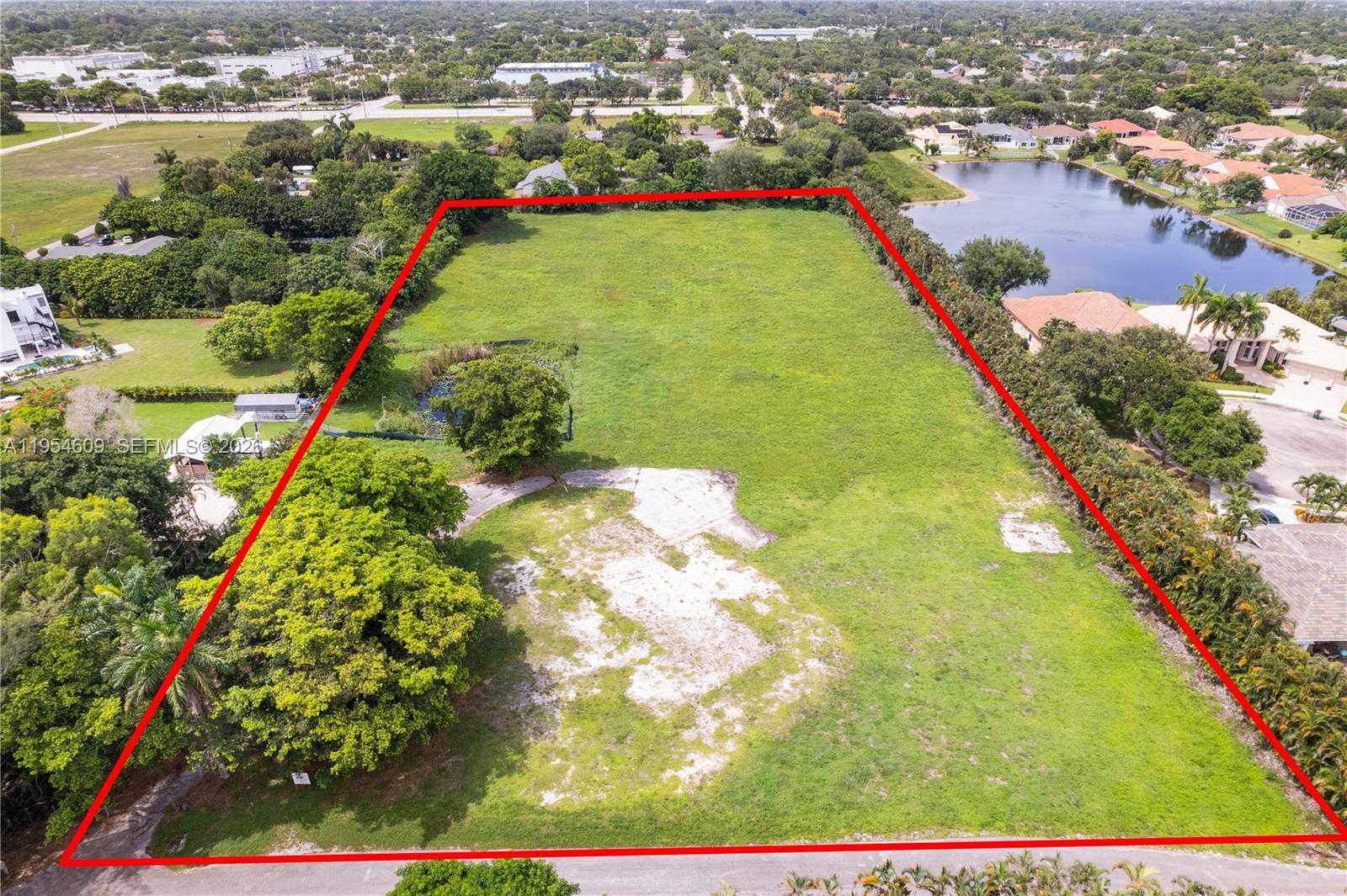 This peaceful and secluded 5-acre vacant lot in Royal Palm Ranches in Cooper City offers versatile development potential. Its central location provides convenient access to major highways, airports, and top-rated schools, making it an attractive opportunity for residential or community-oriented development.