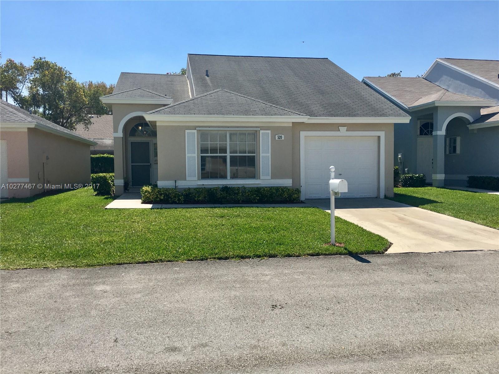 Beautiful updated 2/2 immaculately kept home- new roof, tile & carpet. Vaulted ceilings, screened patio, freshly painted, w/ attached garage, quiet & well-kept neighborhood. Very appealing! will not last! Enjoy all south Florida has to offer, the best fishing, diving & golf! Never worry about upkeep of your home! Maintenance fee includes landscaping, exterior of home painted, clubhouse & pool, rec room& gym, cable w/2 premium channels, & basic internet service, manned front gate & roaming security.