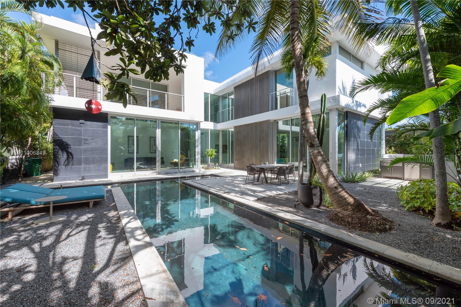 Custom built modern home designed to perfection in secluded enclave of Bay Heights. Grand foyer entrance with double height ceilings, tons of natural light and expansive open spaces great for entertaining, large custom impact windows w/ 12 foot ceilings throughout and exquisite zen backyard surrounded by lush landscaping. This modern masterpiece has 5 bedrooms and 5 bathrooms offering two large master bedrooms with city views of Brickell, custom spa-like bathrooms + over-sized walk in closets. Bay Heights is a quiet but yet central 24-hr patrolled community in Coconut Grove across from Vizcaya Museum and Gardens and a short commute to Brickell, Downtown, the park, beaches, Grove village, Regatta Park and Coral Gables.