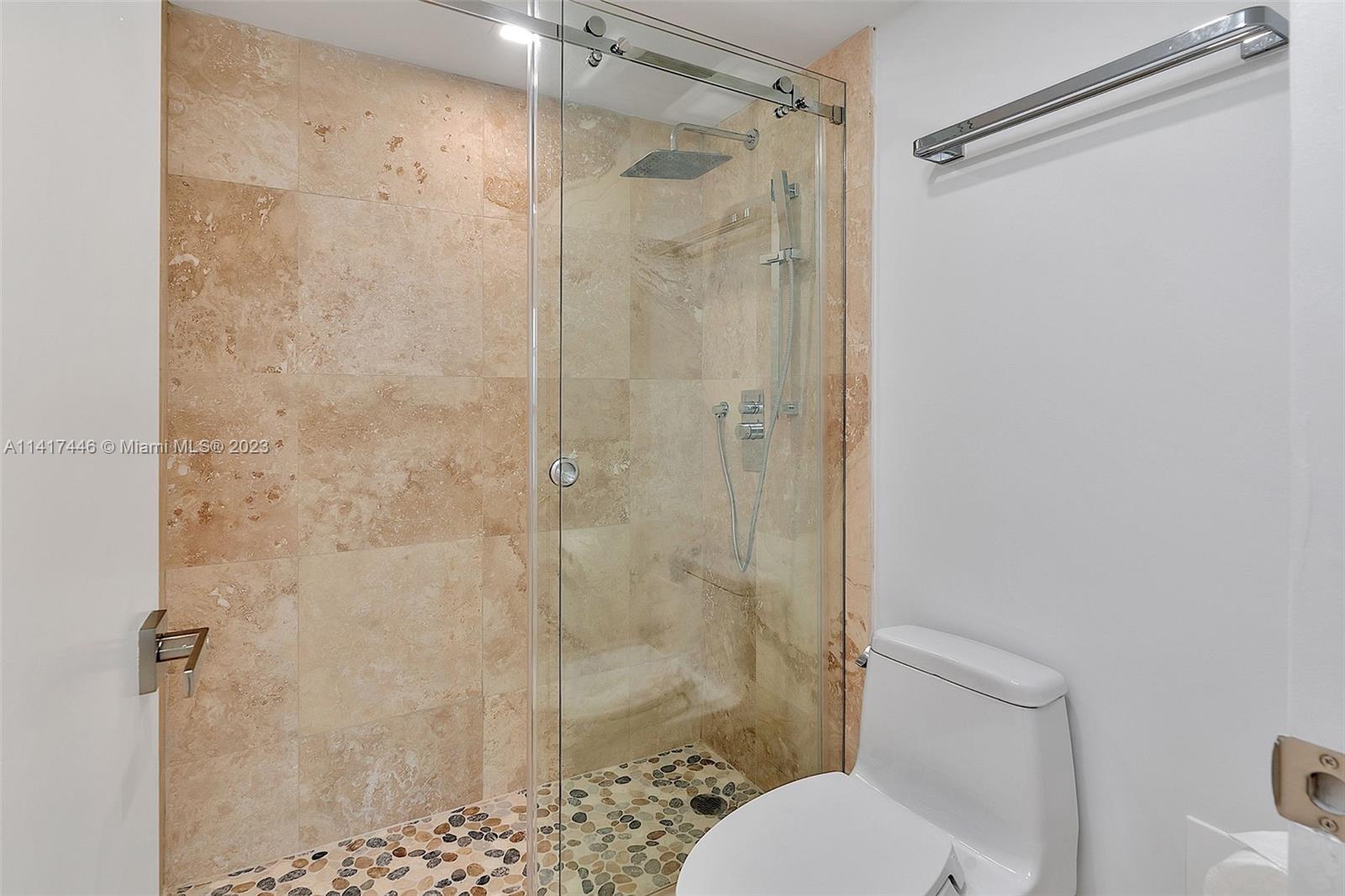 NINE ISLAND AVENUE CONDO - Residential Lease