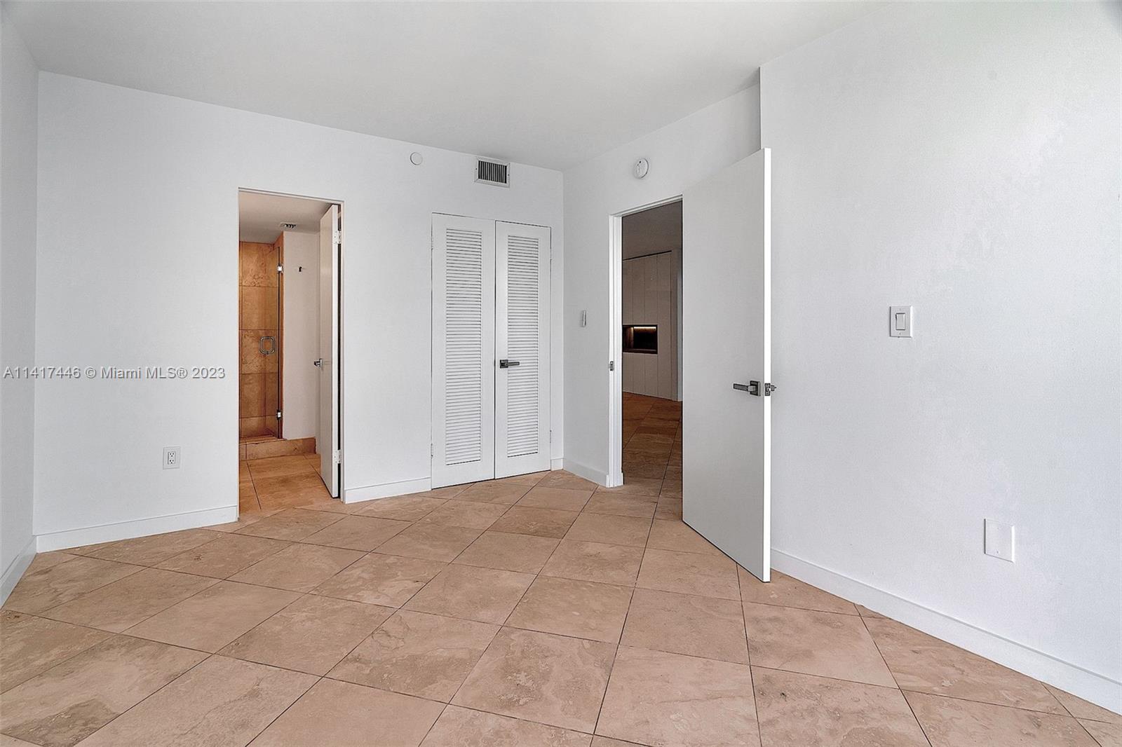 NINE ISLAND AVENUE CONDO - Residential Lease