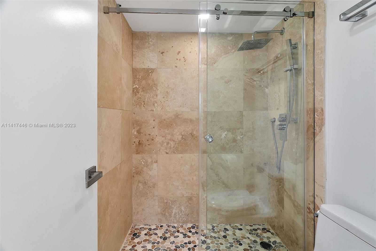 NINE ISLAND AVENUE CONDO - Residential Lease