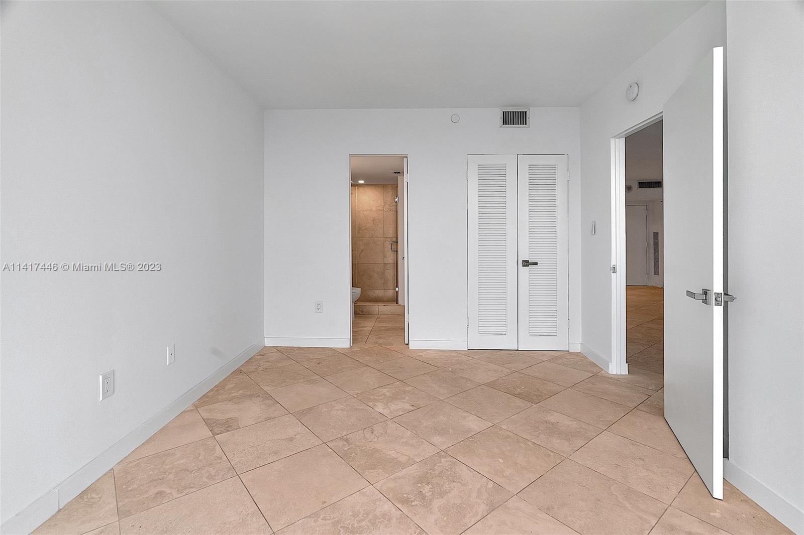 NINE ISLAND AVENUE CONDO - Residential Lease
