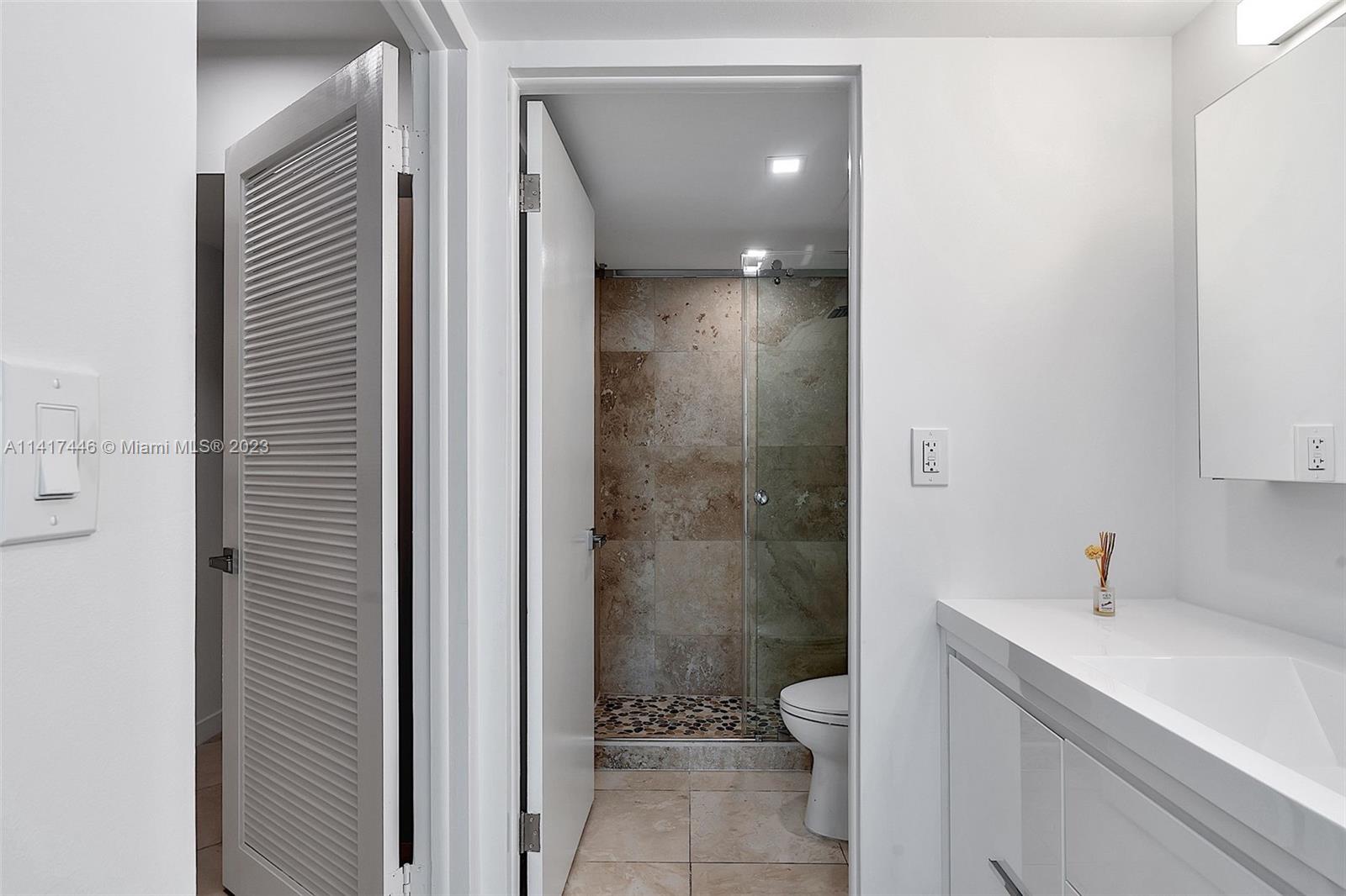 NINE ISLAND AVENUE CONDO - Residential Lease