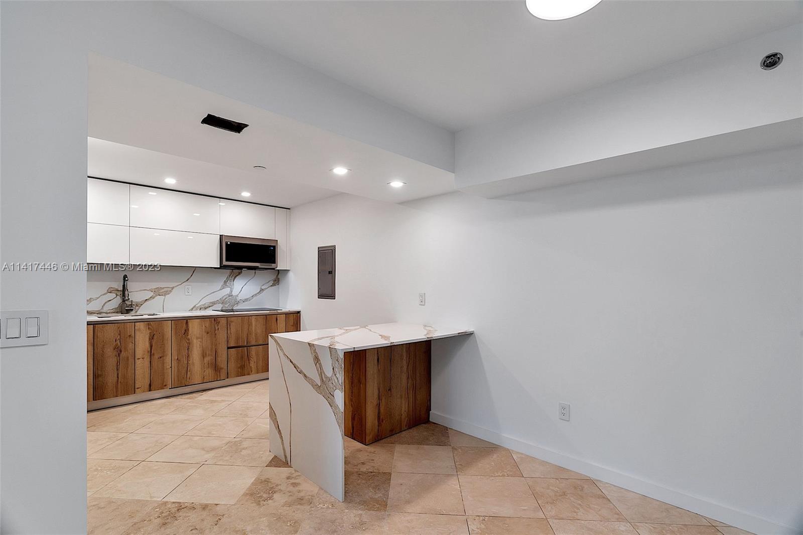 NINE ISLAND AVENUE CONDO - Residential Lease