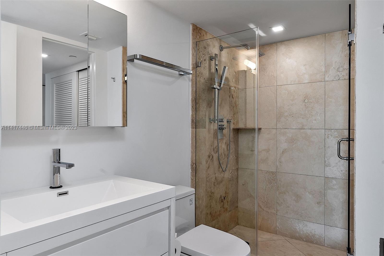 NINE ISLAND AVENUE CONDO - Residential Lease