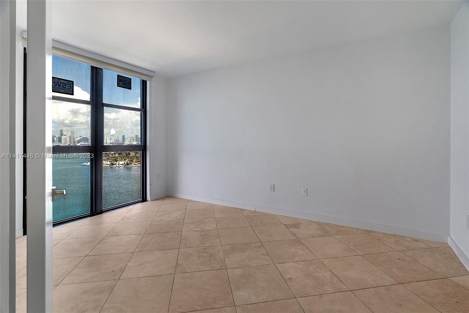 NINE ISLAND AVENUE CONDO - Residential Lease