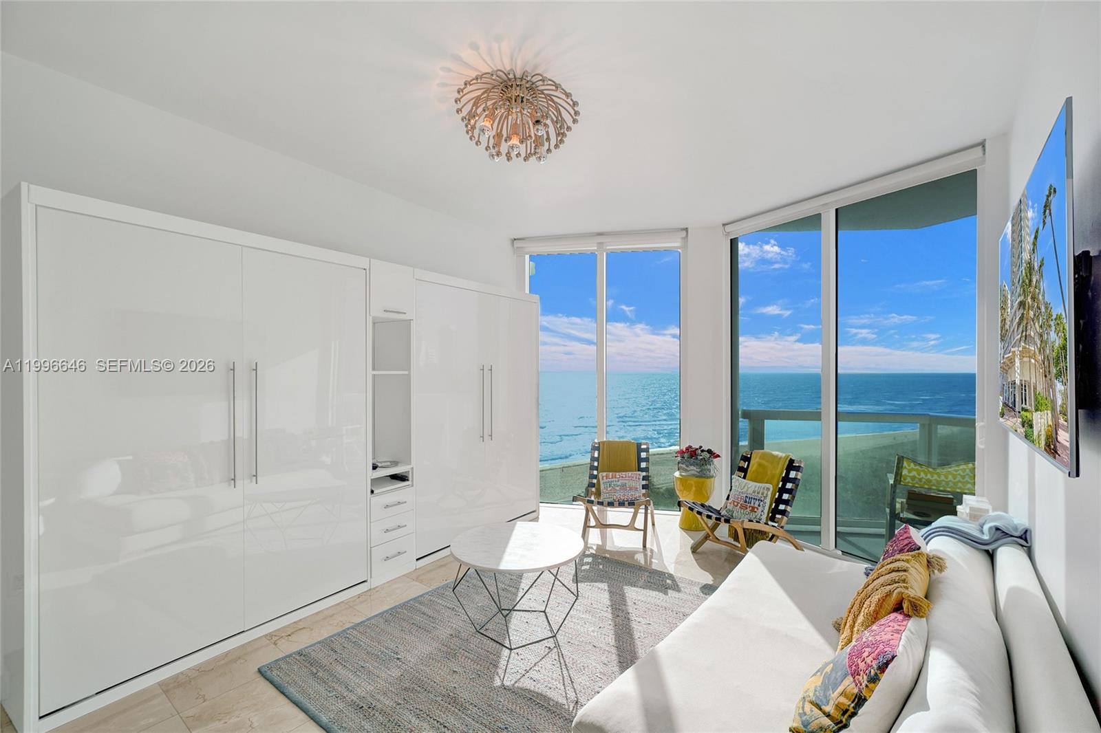 Enjoy stunning spectacular direct ocean views from this beautifully appointed residence in the sought-after Bel Aire on the Ocean. This dazzling condo features elegant marble flooring throughout, stainless steel appliances, and custom interior designer cabinetry. Washer and dryer conveniently located in-unit, built-in Murphy beds make hosting guests a breeze. Pet-friendly building offers a wealth of amenities, including Heated pool & jacuzzi, State-of-the-art fitness center, Built-in BBQ area by heated pool, Gated self-parking & valet service, 24/7 security, Bike and surfboard storage Steps from the oceanfront path, and within walking distance to shopping, fine dining, banks, and pharmacies. Prime location makes for both a perfect home and a fantastic investment opportunity. EASY TO SHOW