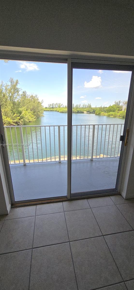 Direct Water view, fully tiled condo with renovated kitchen and large living/dinning area with Balcony. SAGA BAY GARDEN is a secure community in Cutler Bay with pool, BBQ area, small fitness, Tennis Court... Building has elevator, laundry room , special assessment has been approved in Dec 2025 for new roof and owner will pay balance in Full at closing. Perfect for investor as it is rented to a nice couple at market price $1700 till July 31th 2026 next renewal date. Cap rate 9%