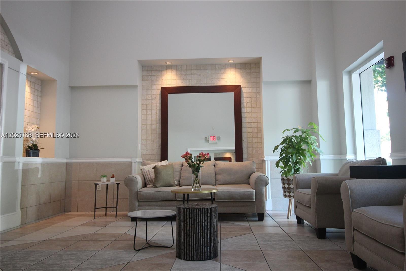 Location, location, location! Beautiful 1-bedroom, 1-bathroom condo at Douglas Grand with balcony and park views. Prime location just minutes from Miracle Mile, Coral Gables City Hall, and the University of Miami. Publix on the ground floor, easy access to major highways and beaches. Features in-unit washer and dryer, laminate floors, fresh paint, and pantry. Enjoy pool and gym amenities. Rent includes water, AT&T Basic U-Verse, and high-speed internet.