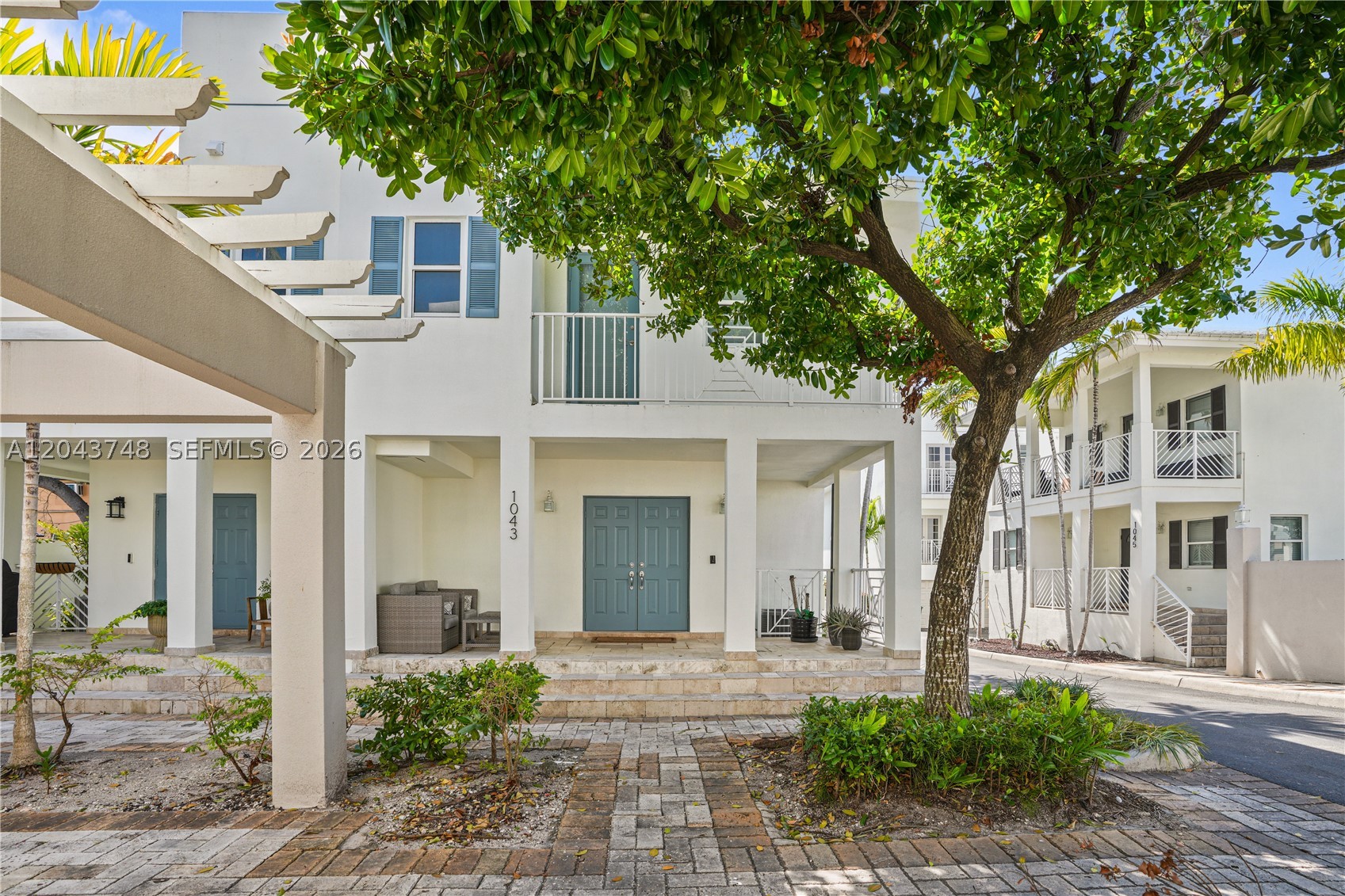 A rare opportunity to own in one of Miami’s most sought-after neighborhoods. Beautifully updated tri-level 2BD/2.5BA townhome located in a gated community in the heart of The Roads. This move-in-ready residence boasts 1721 sqft of living space featuring 1 oversized primary suite, offering exceptional comfort and privacy, 2nd bedroom is also en-suite with own bathroom and private balcony. The second level boasts an open-concept living and dining area, complemented by an updated kitchen with quartz countertops, stainless steel appliances, and a convenient guest half-bath. The unit also has and a 2-car garage and a spacious front patio. Enjoy resort-style amenities, including a pool and BBQ area located directly across from the unit. Ideally situated just minutes from Brickell, Coconut Grove, and Coral Gables, this home offers the perfect blend of privacy, convenience, and urban living. Vacant and easy to show.