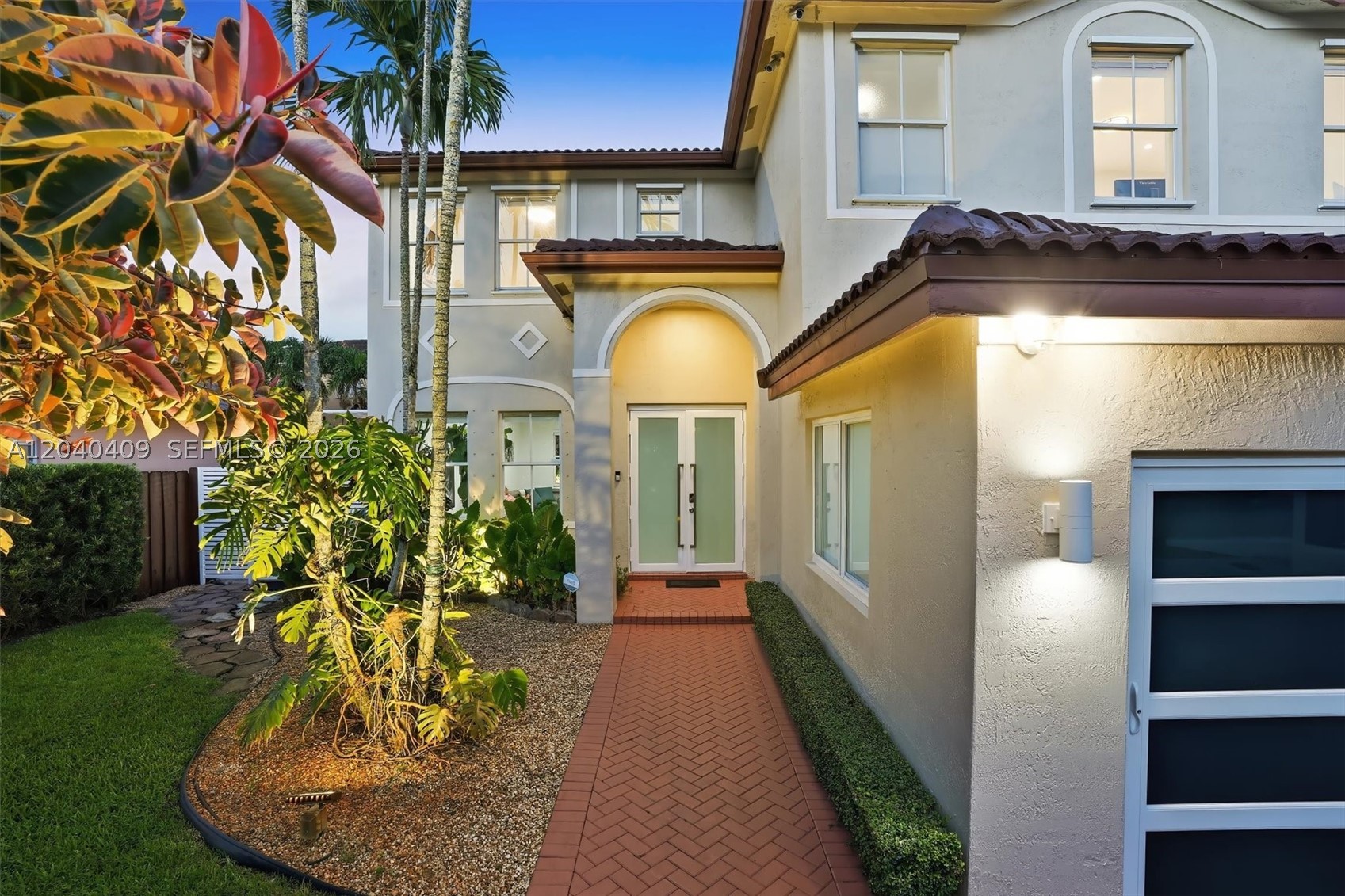 Experience luxury living in this stunning 5-bedroom, 3-bathroom residence featuring a private in-law suite, perfect for extended family or guests. Soaring ceilings, oversized windows, and an open-concept design fill the home with natural light and create seamless flow between living spaces. The updated kitchen features white cabinetry, granite countertops, and stainless-steel appliances.

The spacious primary suite offers a spa-inspired bath with a frameless glass shower and walk-in closet. Outside, enjoy your own tropical oasis with a sparkling pool, jacuzzi, covered patio, outdoor kitchen, and over 40 orchids—ideal for entertaining or relaxing.

Additional features include impact windows and doors, glass garage doors, whole-home audio with indoor and outdoor speakers, Wi-Fi throughout, network wiring in every room, Ring security cameras, alarm system, sprinkler system, lush landscaping, furniture included, and NO HOA. Ideally located near top-rated schools, parks, shopping, and dining, this exceptional home combines elegance, comfort, and modern convenience.