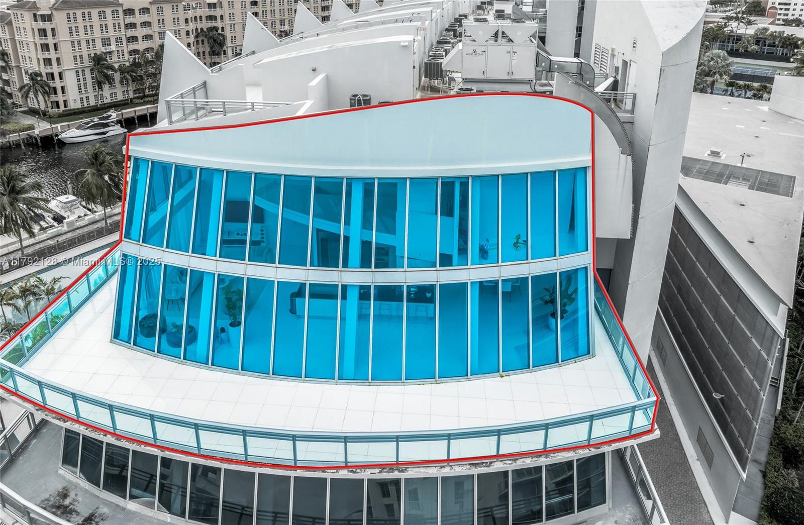 Modern TRI-LEVEL Penthouse plus ROOF TOP in the prestigious Artech Aventura. This is THE only unit with 120' FT private dock for your vessel. A true BOATERS PARADISE ! Spacious 5 bedroom and 5/1-bathroom offering
impressive floor to ceiling panoramic impact windows with direct intracoastal/ocean views. Enter through the
second level and find an open formal living room and kitchen w/ Subzero and Miele appliances, formal dining and
large junior suite with sitting rm/office. Glass staircase takes you to first level with 2 en-suite bedrooms
and on the third level find a spacious loft area, master suite with sitting room/office and an additional bedroom.
Fourth level offers a private roof top terrace/sun deck. State of the art amenities including valet, tennis court,
24hr/sec and more.
