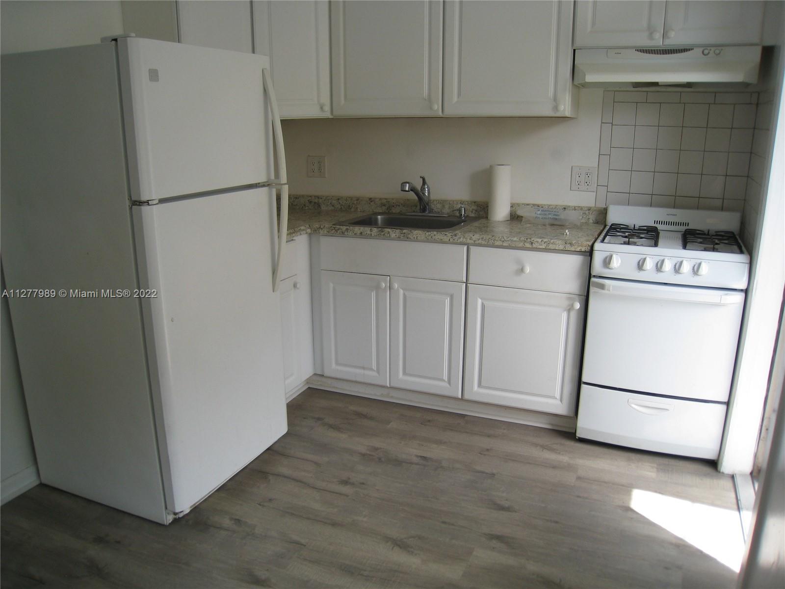 RENOVATED 2 BR 1 BATH DUPLEX: BRAND NEW WOOD LAMINATE FLOORING THROUGHOUT, KITCHEN WITH GRANITE COUNTERTOPS AND GAS STOVE. NEW BATHROOM, CENTRAL AIR, NEW GAS WATER HEATER. GREAT LOCATION JUST SOUTH OF AVENTURA!  WATER IS INCLUDED.....TENANT PAYS ELECTRIC, GAS, & CABLE/INTERNET.  NO SMOKING....NICE YARD TO USE AND RELAX IN! 
LOCKBOX ON FRONT DOOR.....CONTACT LISTING AGENT FOR CODE.

ALL OFFERS MUST BE SUBMITTED WITH AN APPLICATION, VERIFICATION OF INCOME(PAY STUBS), CREDIT REPORT & COPY OF DRIVER'S LICENSE