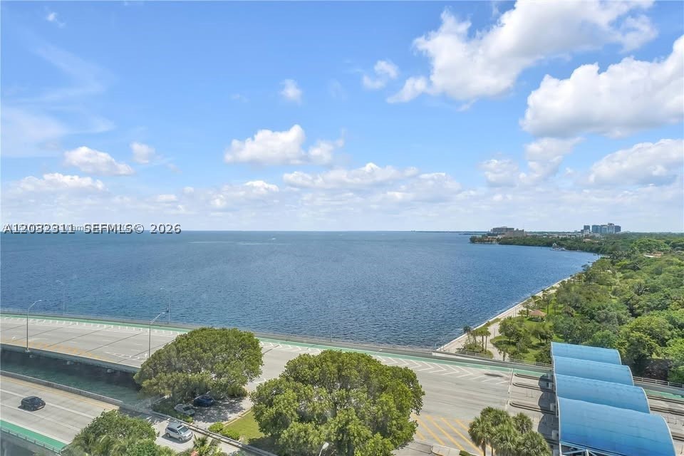 Penthouse residence featuring 1 bedroom and 2 full bathrooms, offering unobstructed stunning sunset views of Biscayne Bay and Vizcaya Park. Filled with natural light, unit features tile and vinyl flooring throughout. Enjoy the convenience of one covered parking space and an array of amenities, including a bayfront pool, jacuzzi, fitness center, visitors' parking, social room, and 24-hour concierge/doorman service. Water/ internet and basic cable are included in the rent. Ideally located in the sought-after South Brickell area on a quiet cul-de-sac within a waterfront enclave, this residence is just minutes from Coconut Grove, Key Biscayne, Brickell's renowned dining and shopping destinations, and provides easy access to I-95. -Available August 3rd