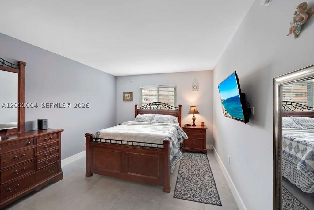 Rare opportunity to own this waterfront updated condo with available dock space in the coveted and gated community of Eastern Shores. Relax and enjoy your one bedroom, one bathroom fully updated condo complete with a covered assigned parking space and pool. Large ceramic tiles, stainless appliances, granite counters, impact doors and windows greet you at the open floor plan entry. A large natural lit bedroom with a custom built in closet make you feel right at home. The bath has a spacious walk in shower, new toilet and vintage style sink. A new ac unit and tankless water heater offer extra comfort. Two closets add extra storage room for guests or beach items. Condo may be purchased furnished or unfurnished.  Low HOA fees. Community is a short ride to the Ocean, major shopping in Aventura, Bal Harbor, Sunny Isles, movie theaters, restaurants, grocery, schools, and parks. Eastern Shores is situated an equal distance between Miami and Ft Lauderdale with easy access to all major highways and airports.  Showings and additional information available upon request.