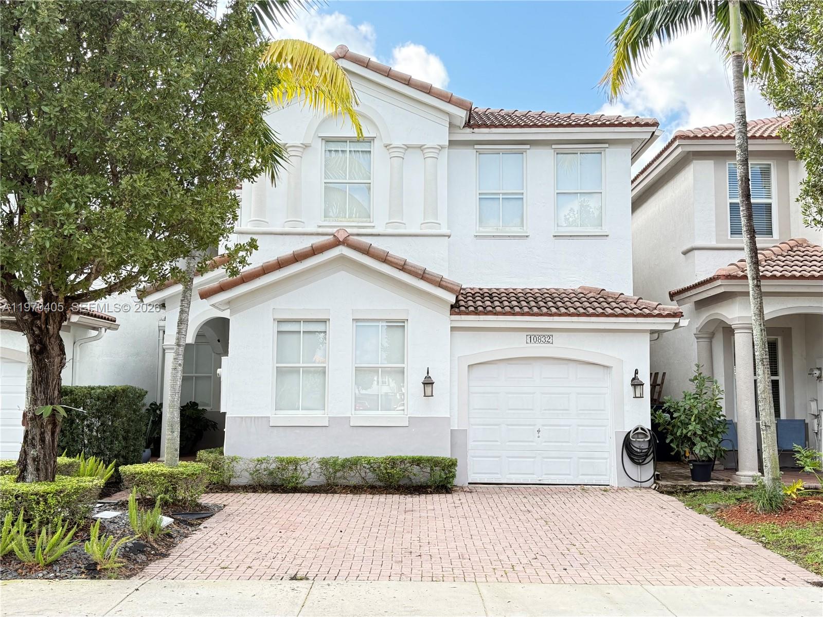 Coach Townhouse. Two Blocks away from MIDTOWN DORAL.4 BEDROOMS AND 3.5 BATHROOMS WITH A BEAUTIFUL LAKE VIEW IN THE BACKYARD AND THE MASTER BEDRM BALCONY! VERY SPACIOUS BACKYARD,  AND ENOUGH SPACE FOR A BBQ AREA, GREAT NEIGHBORS, PUBLIX IS LESS THAN A MILE DISTANCE. RONALD REAGAN HIGH SCHOOL AND ROLANDO ESPINOSA ELEMENTARY SCHOOL IN THE SAME AREA, 2 MINUTES FROM HIGHWAY EXIT. “Property shown only to pre-approved buyers. Proof of funds required for cash offer”. “ The association requires a capital contribution of $2,000”