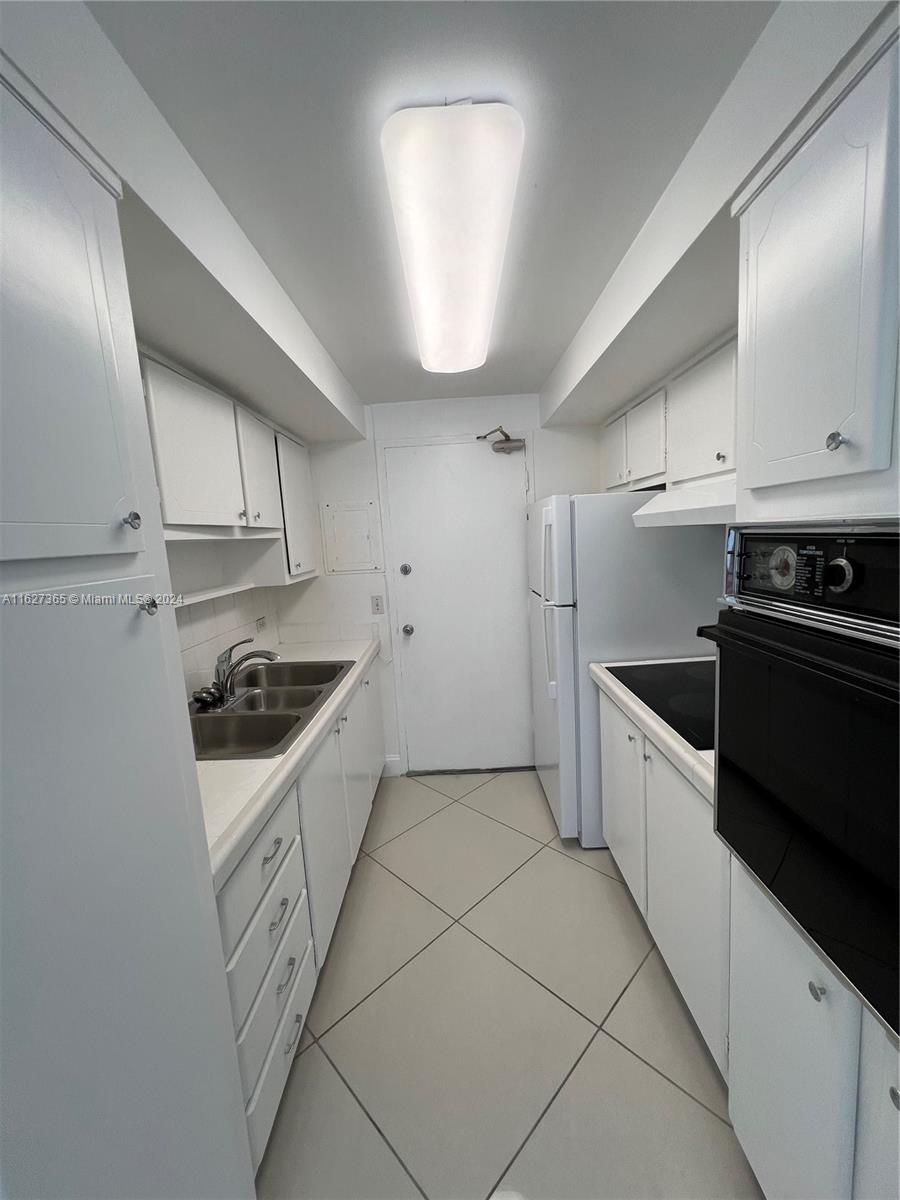 BAY GARDEN MANOR CONDO - Residential Lease