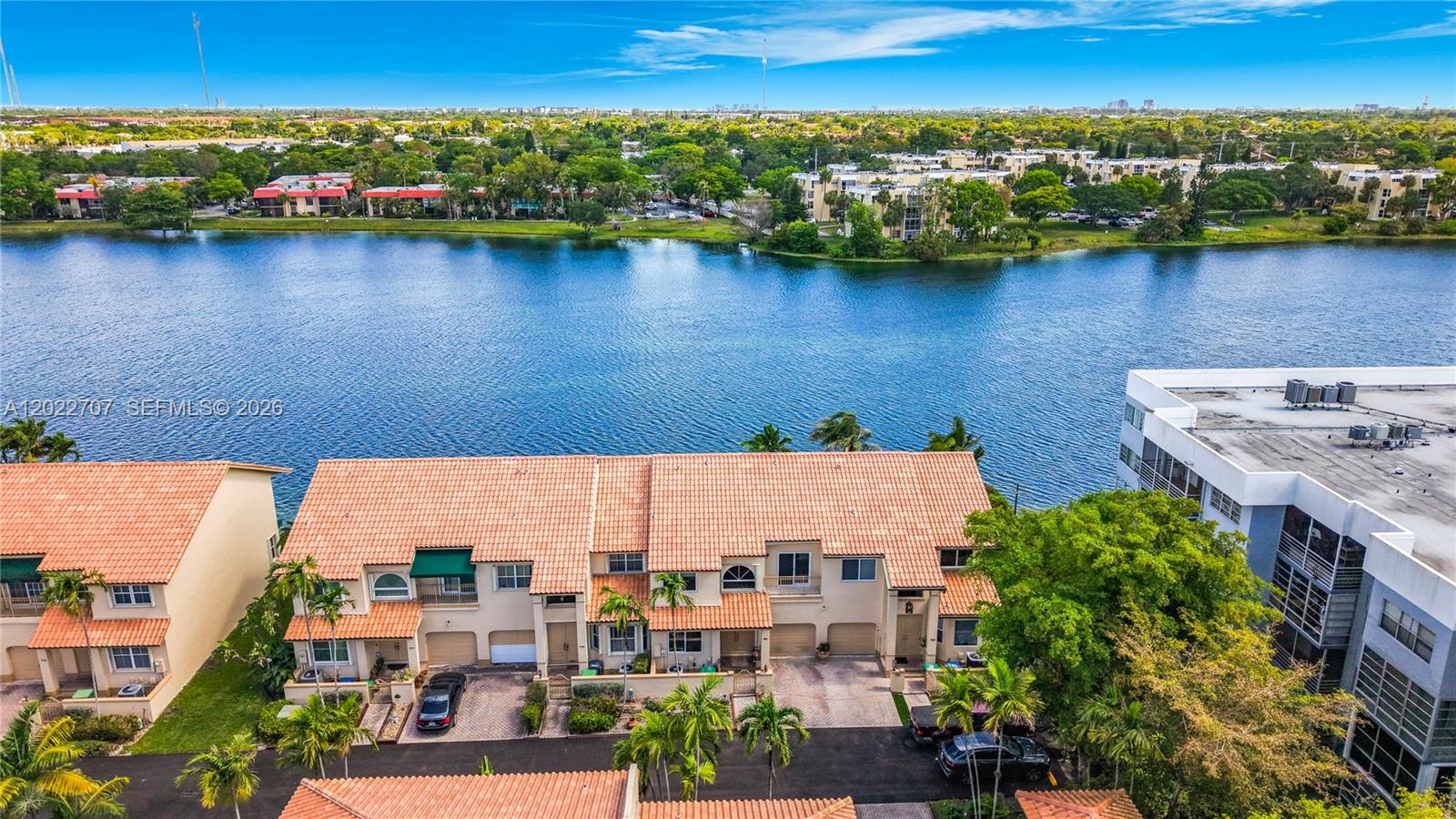 You will be impressed when you first enter this property. Welcome to your dream waterfront oasis, located in the heart of Miami/Aventura. Brand new roof (2024), Hurricane impact windows/door (2024). This meticulously maintained Town Home offers the perfect combination of luxury, tranquility, and modern living. Property Features: Breathtaking waterfront access - enjoy water view with private dock; perfect for boating, fishing or simply soaking in the beauty of nature; Spacious outdoor deck, Modern Kitchen designed with stainless steel appliances, granite countertops, custom cabinetry, and adjoining breakfast nook. Elegant Interior design, open layout with large windows providing natural light in every room and remodeled bathrooms. Prime location, close to Aventura’s finest dinning, shopping etc., while maintaining the peace and serenity of a waterfront retreat!