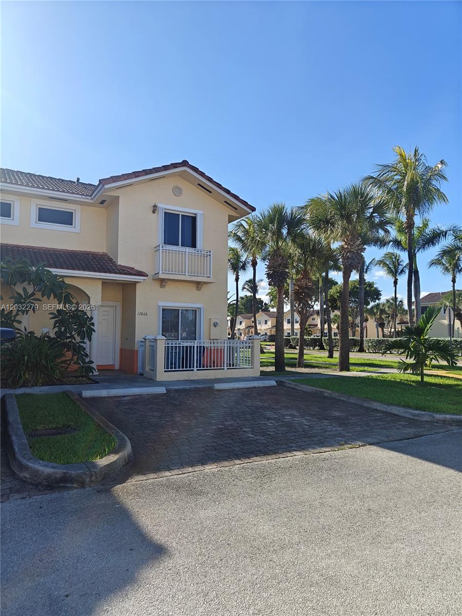 THIS CORNER TOWNHOUSE AWAITS YOU. BE PART OF THE QUAINT TUSCAN LAKE VILLAS COMMUNITY. PROPERTY HAS GUEST PARKING RIGHT ACROSS. AMENITIES INCLUDE A CLUBHOUSE AND POOL. INTERIOR FEATURES INCLUDE: STAINLESS STEEL APPLIANCES, WASHER & DRYER (LAUNDRY ROOM), LIVING ROOM, DINING ROOM AND KITCHEN WITH WOOD CABINETS AND PANTRY. PROPERTY IS TILED THROUGHOUT.EXTERIOR FEATURES INCLUDE: WOODEN DECK PATIO WITH SIDE DOOR ENTRANCE, ACCORDION SHUTTERS. 2 ASSIGNED PARKING SPACES RIGHT IN FRONT OF THE UNIT. COMMUNITY FEATURES A CLUBHOUSE AND POOL. CENTRALLY LOCATED TO LOCAL SHOPPING AND DINING AND ALL MAJOR HIGHWAYS. LOW HOA FEES (CABLE AND HIGH SPEED INTERNET INCLUDED).