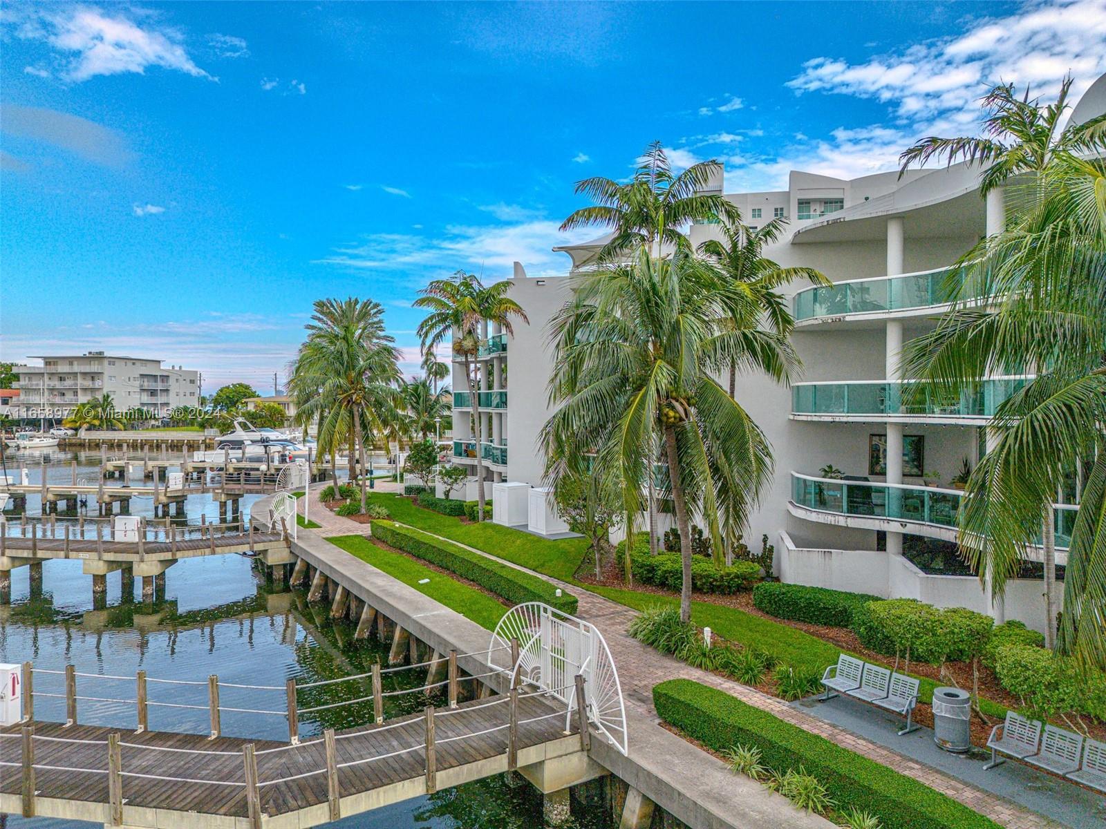 Experience breathtaking bay and marina views from this luxury waterfront residence in sought-after North Bay Village. The full-service 360 condo and marina development includes 3 bedrooms, 2 baths, and a 2-car garage (one covered) along with a storage room. 
Features include impact-resistant glass, elegant carrara marble floors, 24-hour security, and a concierge desk with unlimited valet service. Residents can enjoy a fantastic pool area, a fitness center, a market, a recreation room, and more. Unwind on the spacious balcony with stunning intercoastal views. Remodeled kitchen with all stainless steel appliances.