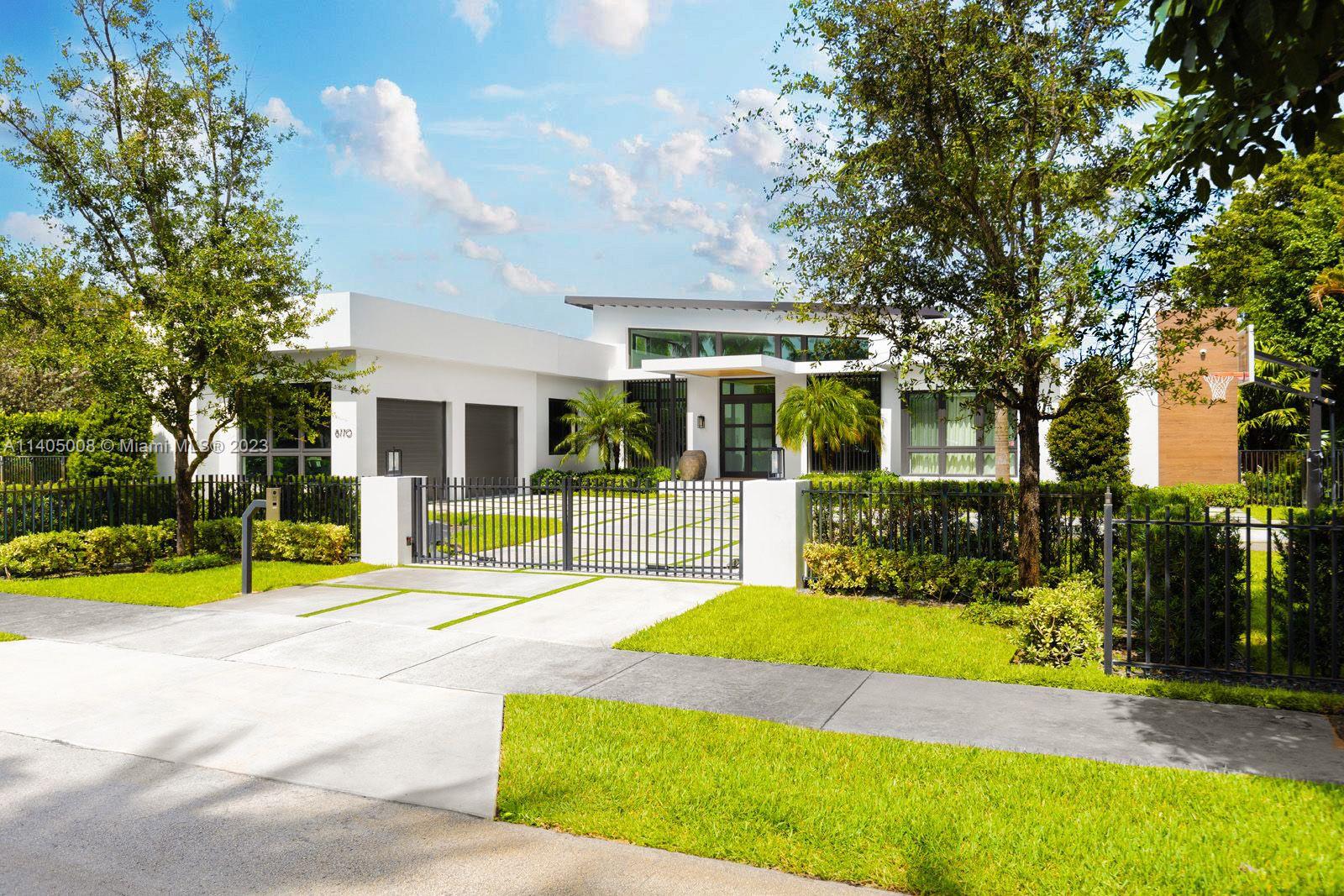 Built by the legendary Hollub construction, this Mid Century modern new construction home is meticulously designed & crafted to the highest standards. This 5 bed 5.5 bath home boasts meticulous design and impeccable finishes. he primary suite is a true sanctuary with abundance of natural light, 2 generous walk-in closets, and a luxurious bathroom.The remaining 4 bedrooms include its own bathroom and large walk in closets. The professionally landscaped yard and swimming pool invite you to bask in the serenity and privacy of this space. This home is being sold with high-end furniture, providing a turnkey solution for those seeking a seamless transition into luxury living. The professionally designed furnishings enhance the elegance and sophistication of this incredible home