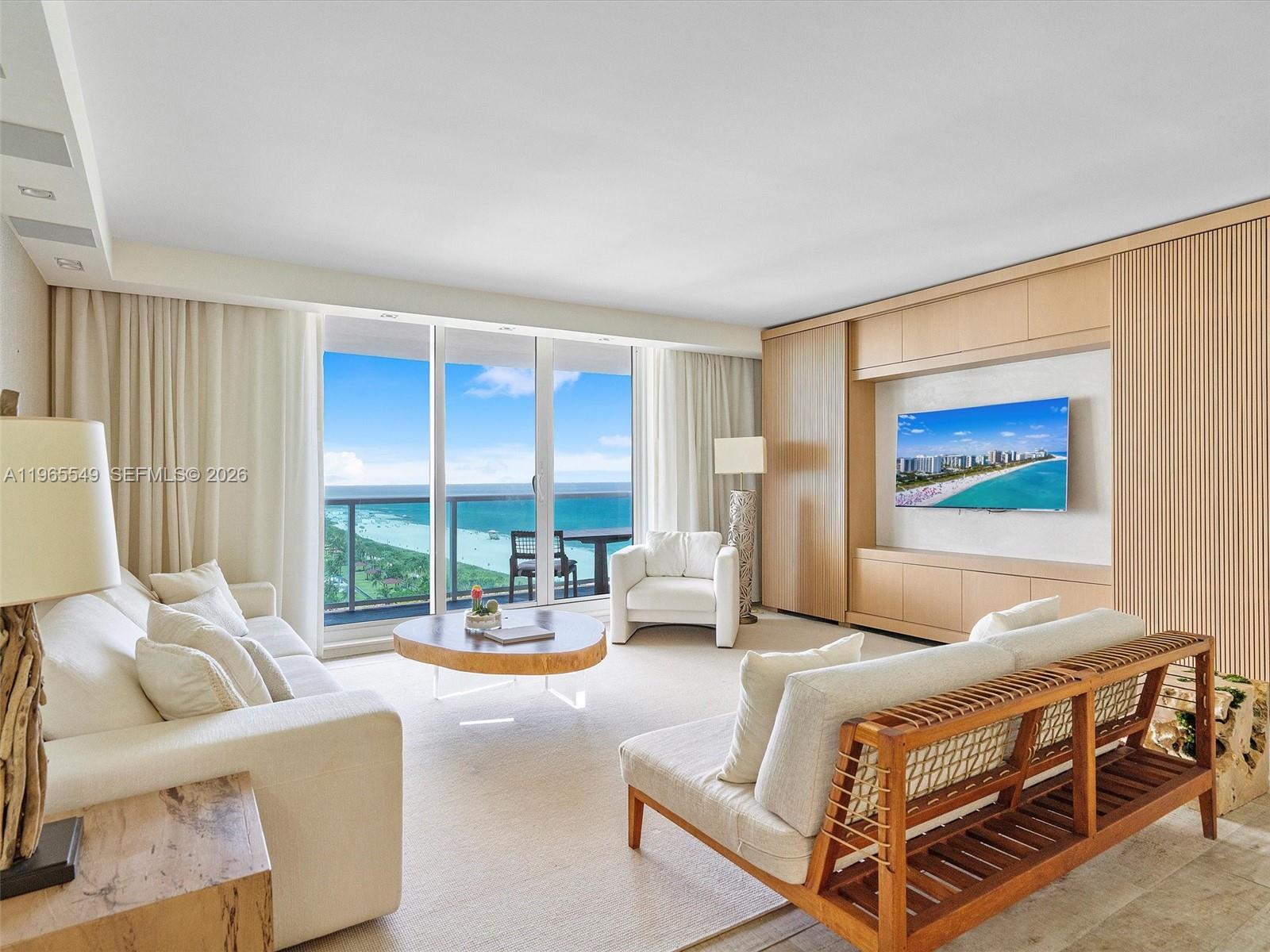 Wake up to uninterrupted Atlantic views from this rare direct ocean 3-bedroom custom residence at 1 Hotel & Homes South Beach. Designed for those who appreciate elevated coastal living, this expansive home blends refined natural finishes with the effortless sophistication of a five-star resort. Floor-to-ceiling glass frames panoramic sunrise views, filling the open living space with natural light and endless blue horizon. The thoughtfully designed layout offers generous living and dining areas, ideal for entertaining or relaxing in complete privacy. Custom upgrades and curated finishes enhance every room, creating a seamless balance between modern luxury and organic warmth.  The primary suite overlooks the ocean and features a spa-inspired bath, with two additional bedrooms offering comfort and flexibility for guests or family. As an owner at 1 Hotel & Homes, enjoy full access to world-class amenities including multiple oceanfront pools, full-service beach club, Bamford Wellness Spa, state-of-the-art fitness center, valet, concierge, and award-winning dining. This is more than a residence, it is a lifestyle defined by privacy, service, and direct connection to the ocean. Professionally managed by Five Star Luxury Travel, the leading luxury rental management company at 1 Hotel, this residence offers exceptional short-term rental potential, making it ideal as a primary home, second residence, or income-producing investment.