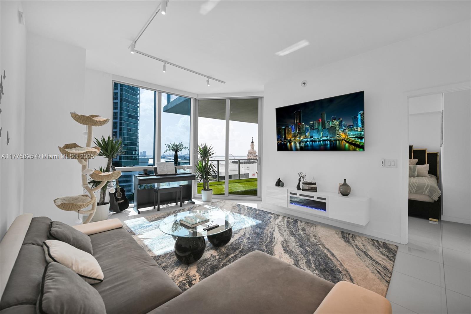 Luxurious 2-bed + den (converted to 3rd bed/office), 3-bath condo at Paramount World Center. Private elevators, Directly overlooks Miami’s best pool below with partial bay views. Across from Miami Worldcenter mall—largest Apple Store, shops, and hot new restaurants. Walking distance to Adrienne Arsht Theater and Opera house, Pérez Art Museum, Frost Museum of Science, Bayside Marketplace, and Kaseya Center. Paramount boasts Florida’s top amenities: golf simulator, boxing ring, gym, studio, and theater. This building has eveything in the new hottest part of Miami. Nearby to Whole Foods, Publix, Target, this building has it all