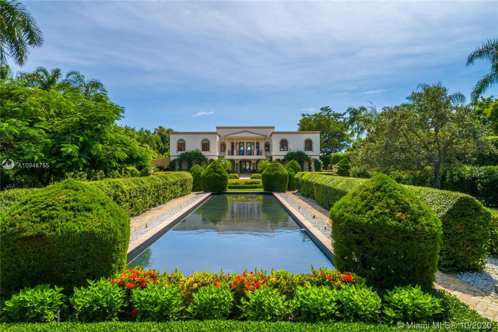 This magnificent, remodeled neoclassical masterpiece is the finest move-in condition home available on Indian Creek Island. Dubbed the "Billionaire Bunker" by Forbes, this private 300-acre island has only 36 home sites, a 24hr police force, and an 18-hole championship golf course/club. The 1.26 acre estate features romantic manicured gardens, reflecting pools, 26ft high domed ceilings, opulent double staircase, open entertaining areas, large family/screening room, wood-paneled office, large gym (could be 7th BR), and a huge master bedroom with 2 full baths. Beautiful resort-style pool & large dock.
