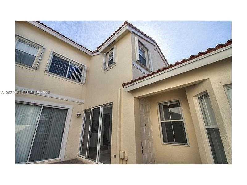 CARNER UNIT, TILE THROUGHOUT FIRST FLOOR AND CARPET IN SECOND. BEST MODEL WITH 3 FULL BATHROOMS. LARGE PATIO, GREAT FOR BAR-B-QUE. LAUNDRY ROOM WITH TOP OF THE LINE WASHER AND DRYER. EAT-IN KITCHEN. STORMS SHUTTERS. GREAT GATED COMMUNITY WITH LOTS OF GREEN,ON THE NATURAL PRESERVE, CLUBHOUSE, TENNIS, GYM, AND PLAYGROUND. CLOSE TO BEACH AND 5 MIN.TO DOWNTOWN HOLLYWOOD. 15 MIN. TO FORT LAUDERDALE AIRPORT AND CRUISE SHIPS. LARGE PETS ALLOWED WITH ADDITIONAL DIPOSIT