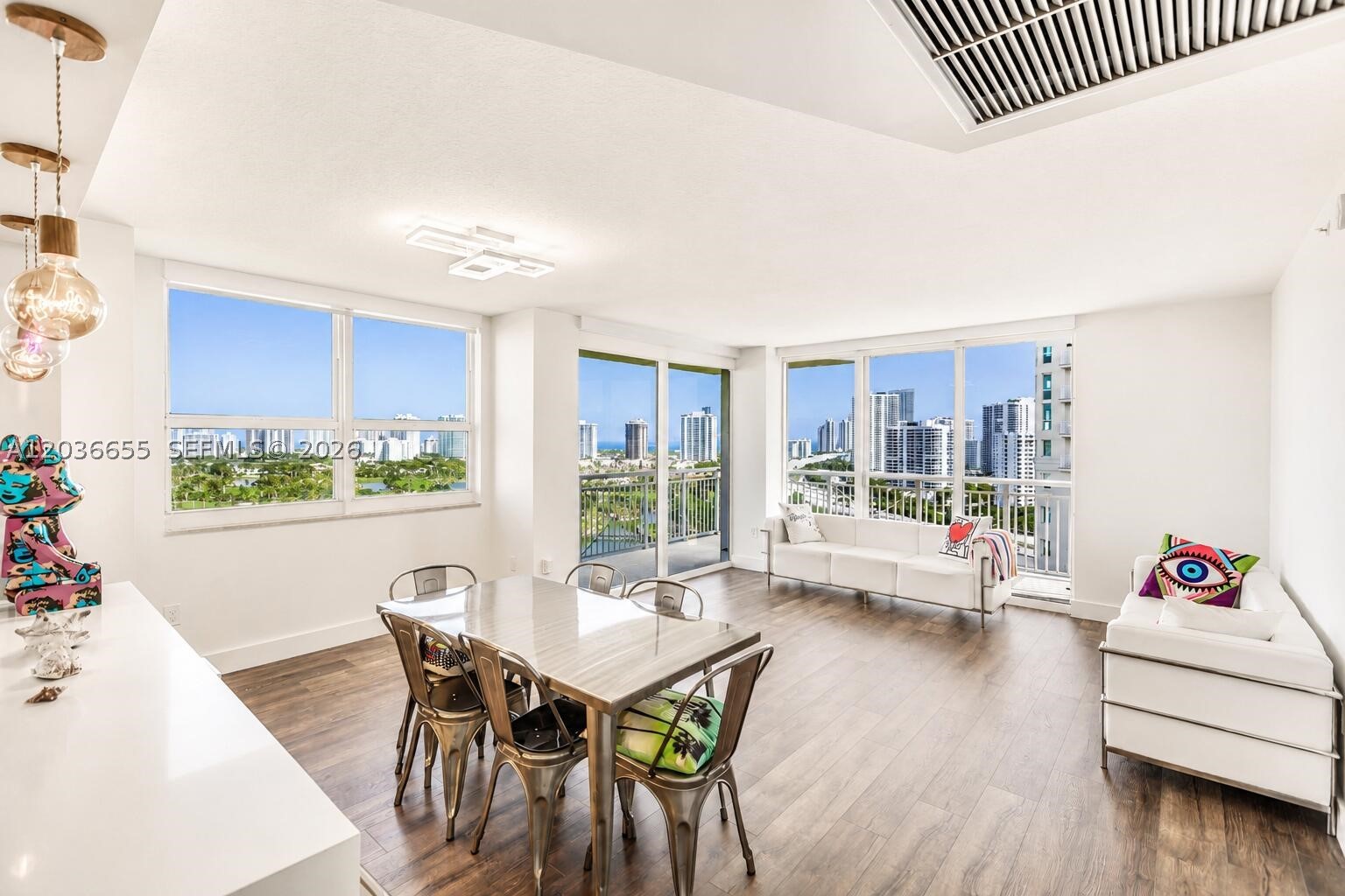 This STUNNING 19th Floor CORNER UNIT delivers BREATHTAKING PANORAMIC VIEWS of the Intracoastal Waterway, golf course, and ocean visible throughout the entire residence - and includes 2 DEDICATED PARKING SPOTS. Set within a LUXURY TOWER amid lush, beautifully manicured tropical grounds, residents enjoy RESORT-STYLE LIVING at its finest. Take a dip in the sparkling pool or relax on the scenic waterfront deck. Stay active in the 2-story fitness center and yoga studio, or unwind in the sauna and spa. Enjoy the billiards room, business center, and BBQ area. The building features 24/7 SECURITY, attended lobby, and valet parking. Walk to the BEACH, AVENTURA MALL, premier dining, cafes, and grocery stores. Enjoy a walk or jog around the famous Don Soffer Aventura Exercise Circle!
